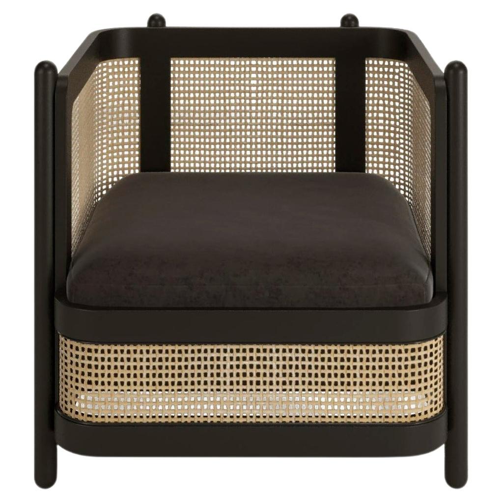 Nest Armchair with cane details