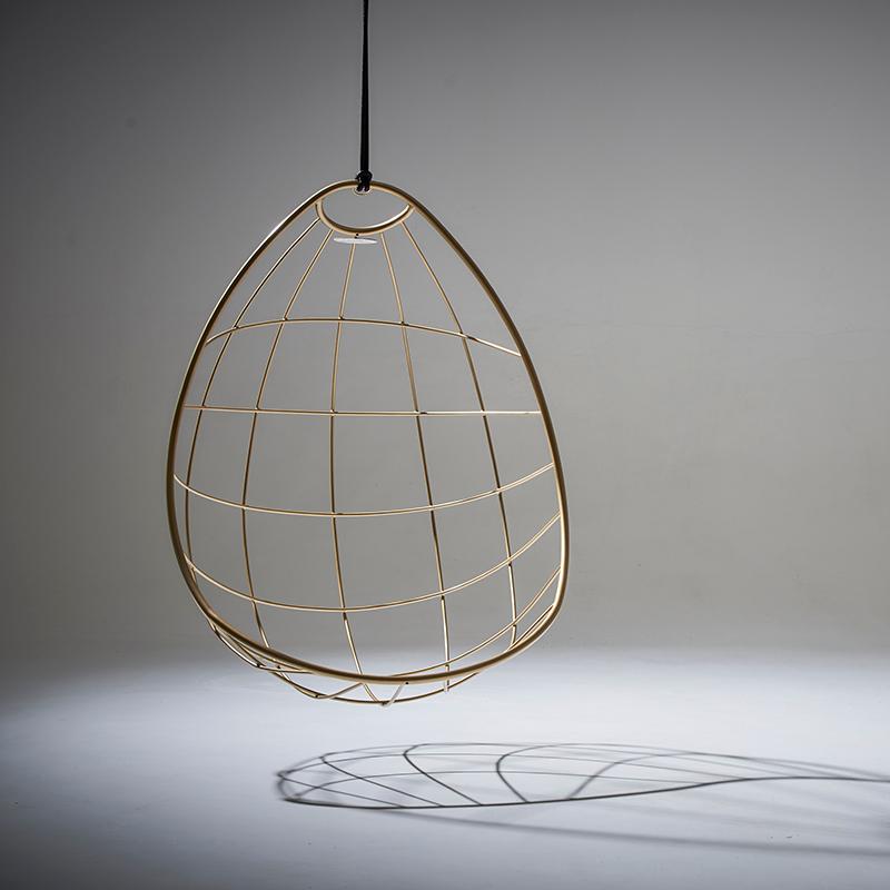 The Nest Egg hanging swing chair is inspired from the organic forms in bird nests and has a natural egg shape. The pattern detail is reminiscent of tree branches that intersect, grasses that are intertwined, the veins in dragonfly wings, veins in