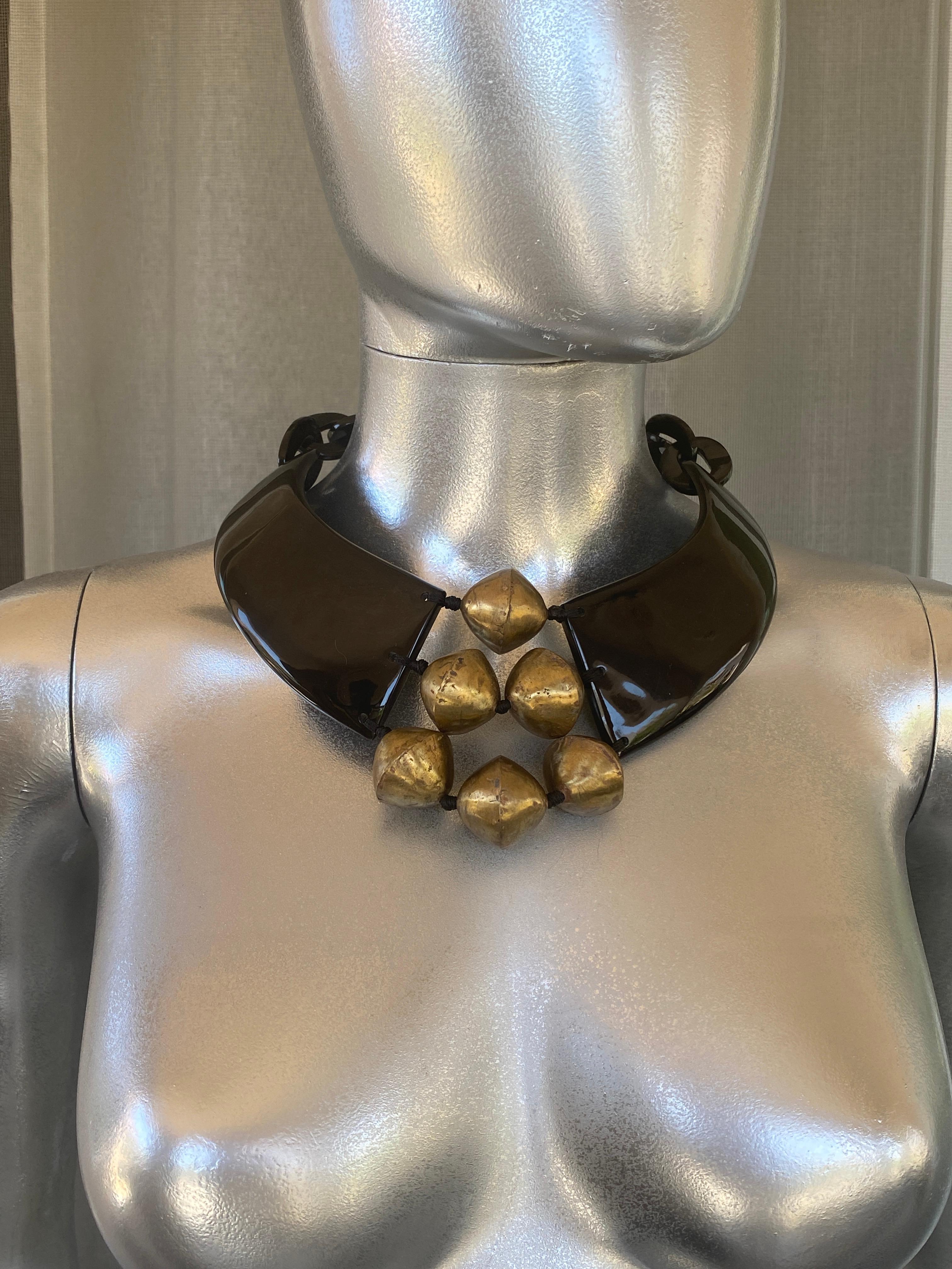 This very special necklace came from the Simons estate in Rancho Mirage, a socialite, philanthropist and a amazing Fashionista with impeccable taste. Purchased at Neiman Marcus in Beverly Hills, this statemate necklace has a modern African/Ethnic
