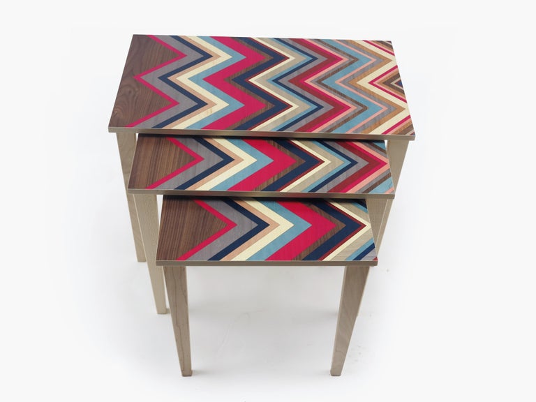 This set of nested tables from the  w o o d p o p  studio is an example of the type of modern marquetry that  w o o d p o p  is becoming synonymous with.  Since its inception 10 years ago - the studio has specialised in marquetry and inlay work;