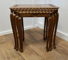 Mid-20th Century Anglo-Indian Nest of Four Carved Teak Tables