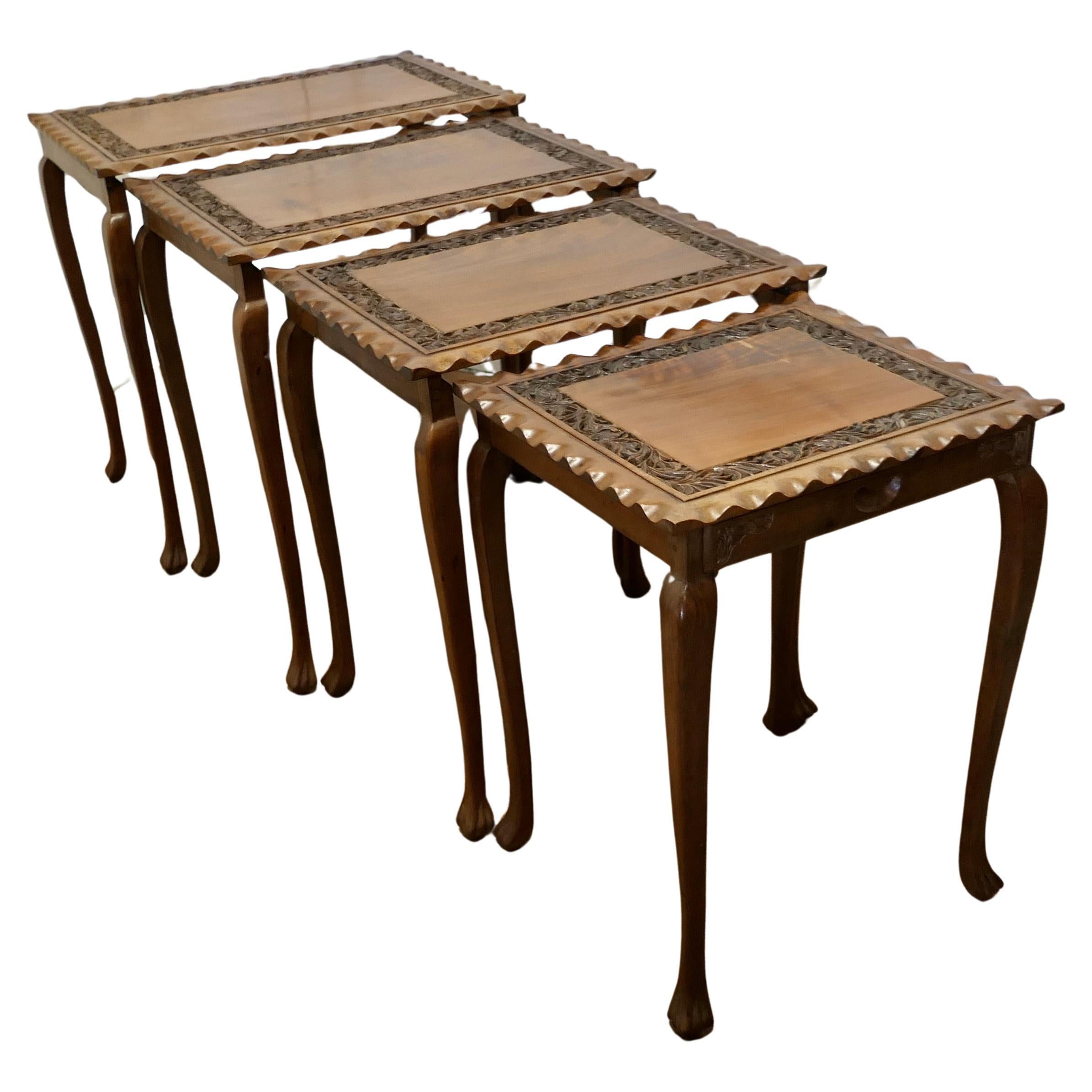  Nest of 4 Tables, in Carved Teak    