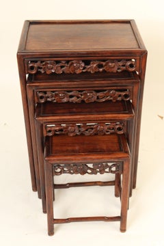 Nest of Four Chinese Teak Wood Tables