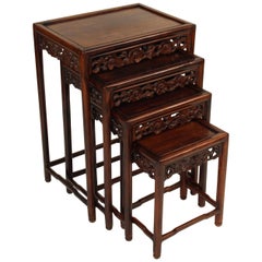 Nest of Four Chinese Teak Wood Tables