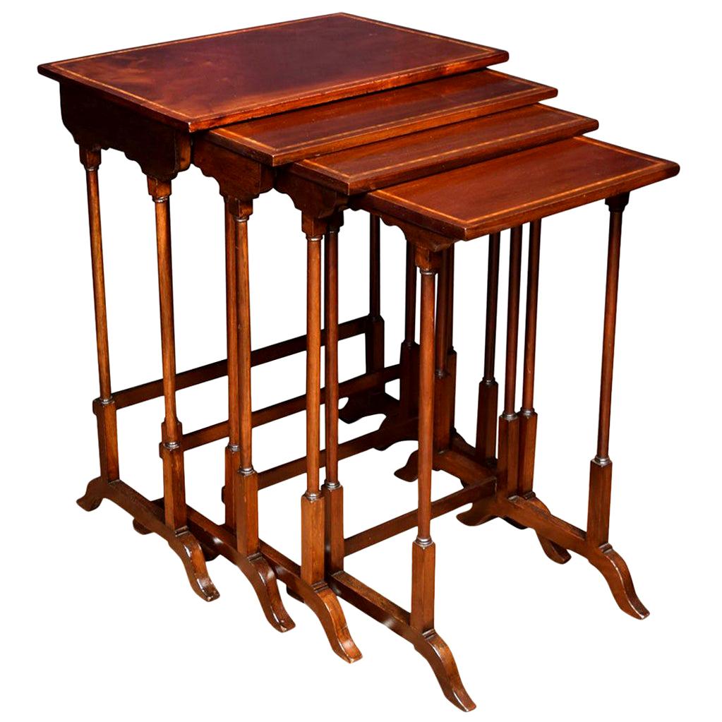 Nest of Four Mahogany Inlaid Tables