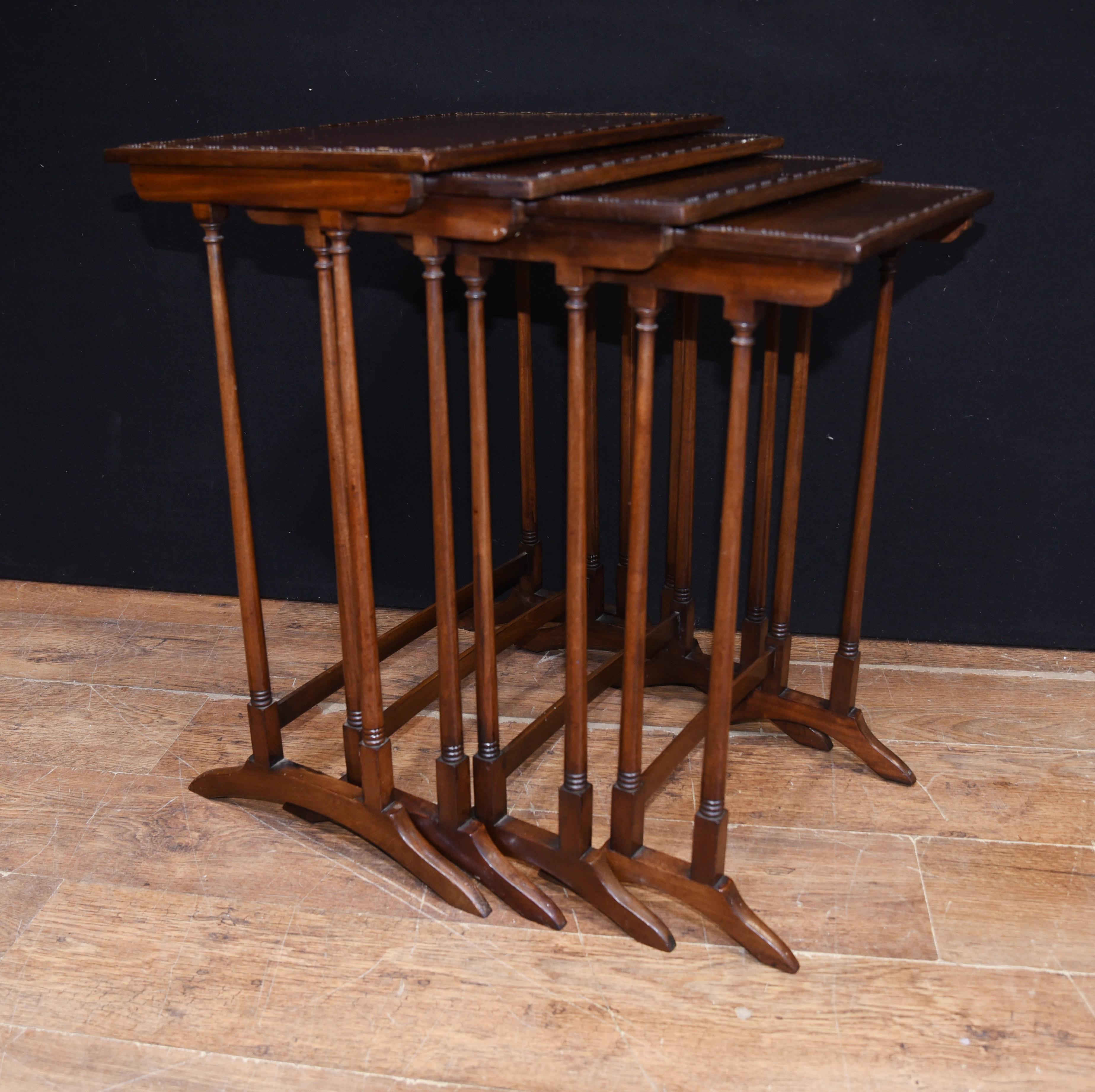 Early 20th Century Nest of Four Regency Style Tables Circo 1920 with Carved Borders For Sale