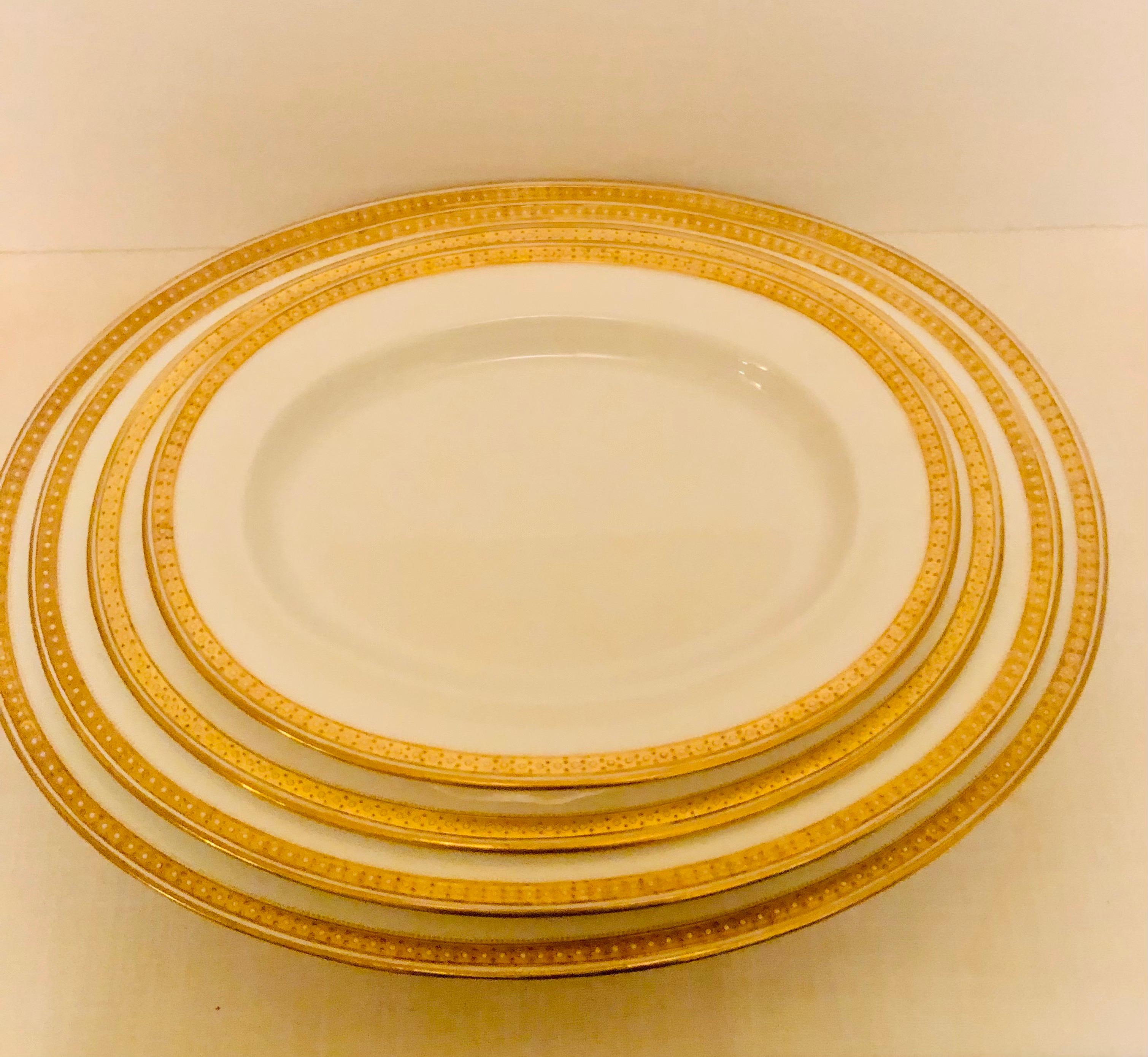 Nest of Four Spode Copeland Serving Platters With Gold Border and White Jeweling 9