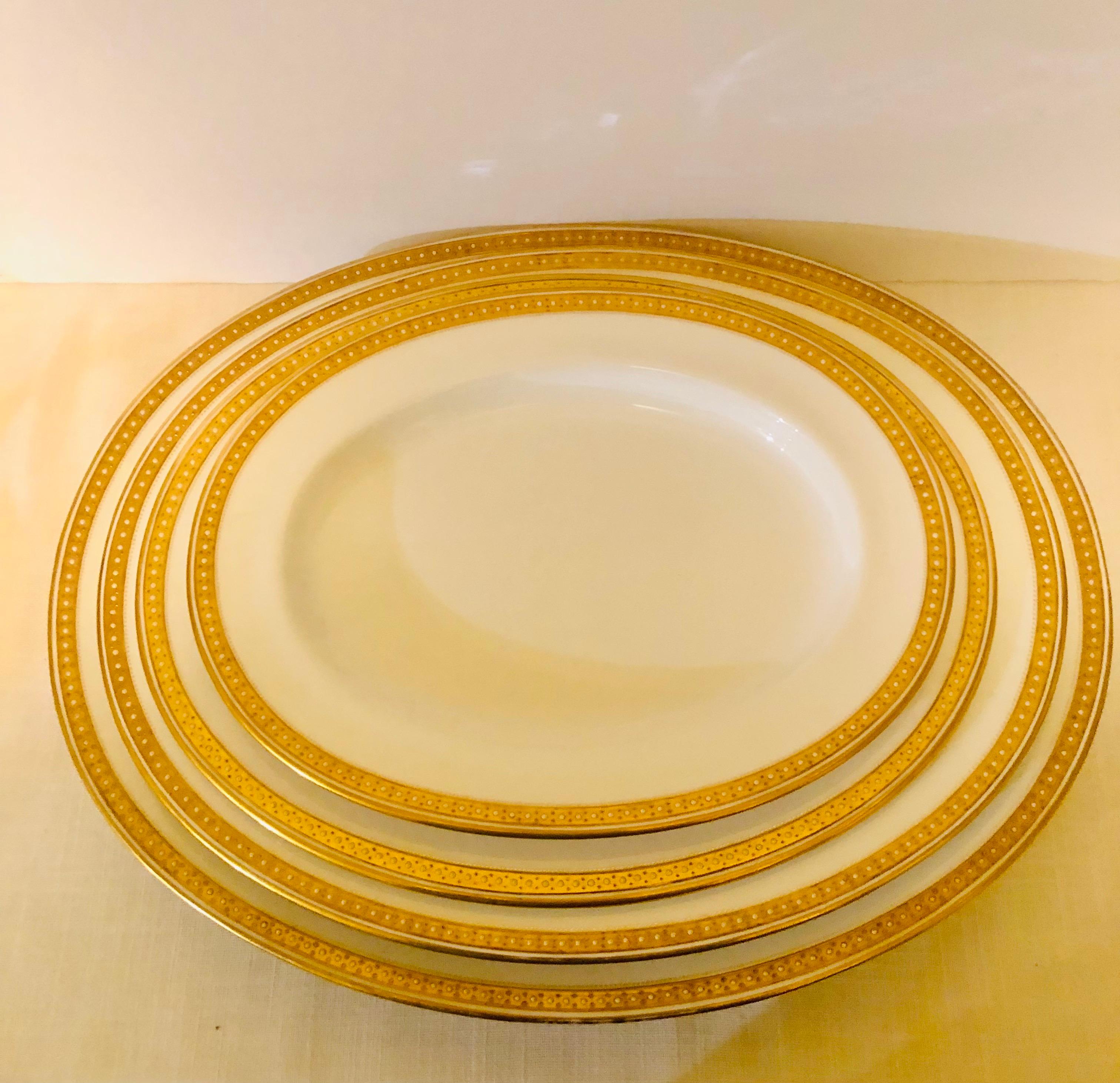 Early 20th Century Nest of Four Spode Copeland Serving Platters With Gold Border and White Jeweling