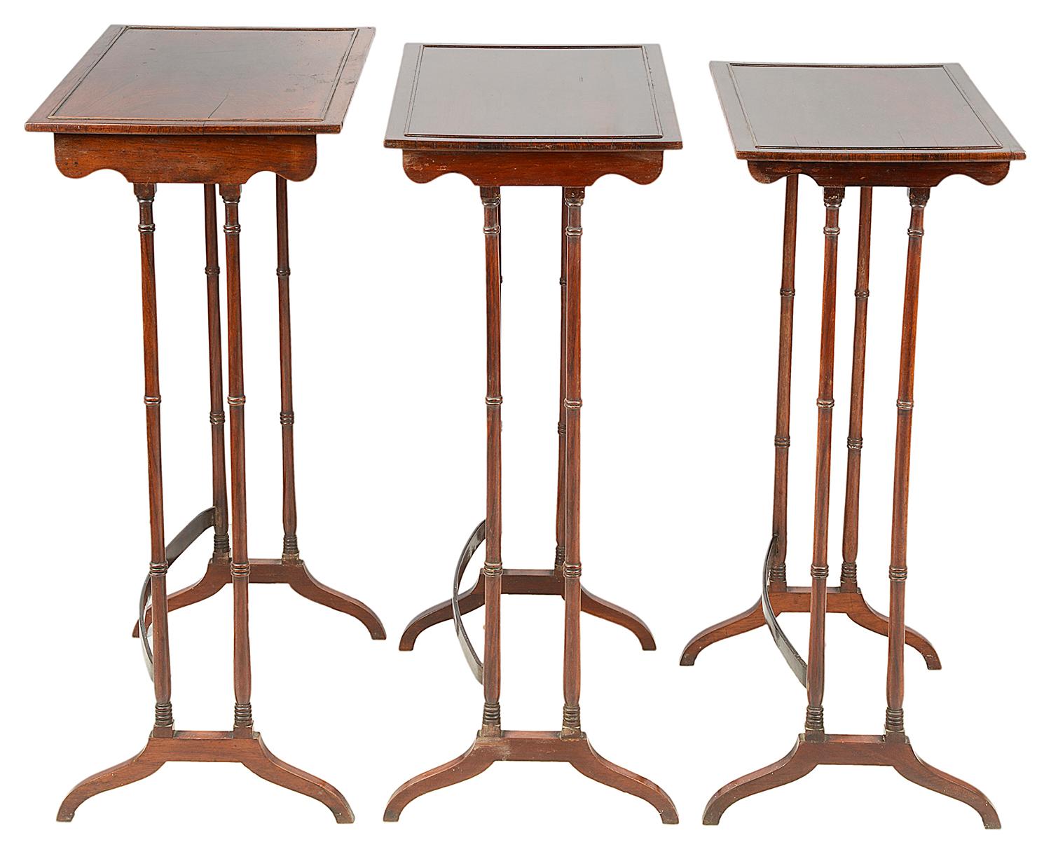 A good quality nest of three Regency period rosewood tables. Having a beaded boarder to the tops, raised on turned tapering ring turned legs, united by stretchers.