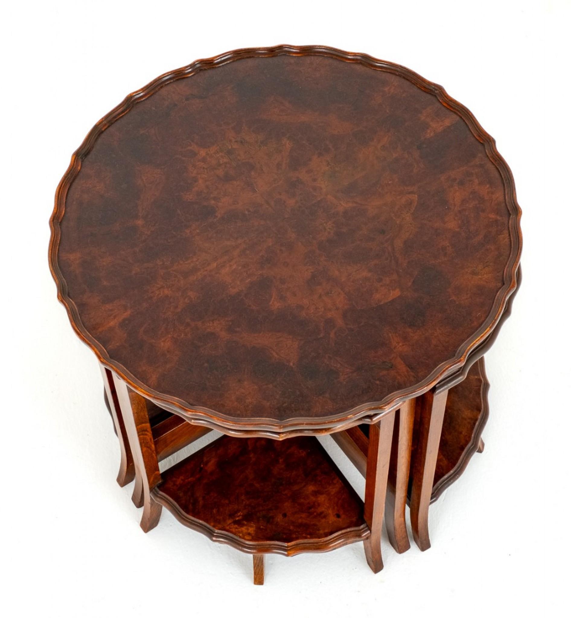Walnut Nest of 5 Tables.
This Interesting Nest of Tables Comprising of a Circular Central Table with 4 Smaller Tables.
All Tables Having Wonderful Burr Walnut Timbers and Pie Crust Moldings.
The Smaller Tables Having Useful Undertrays.
Presented in