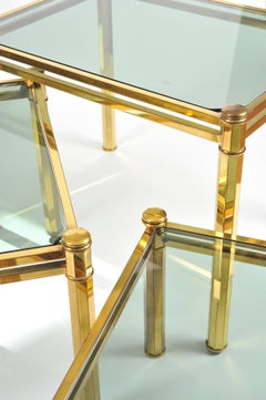 Nest of three Italian Brass Side Tables with pale smoked glass tops, 1960