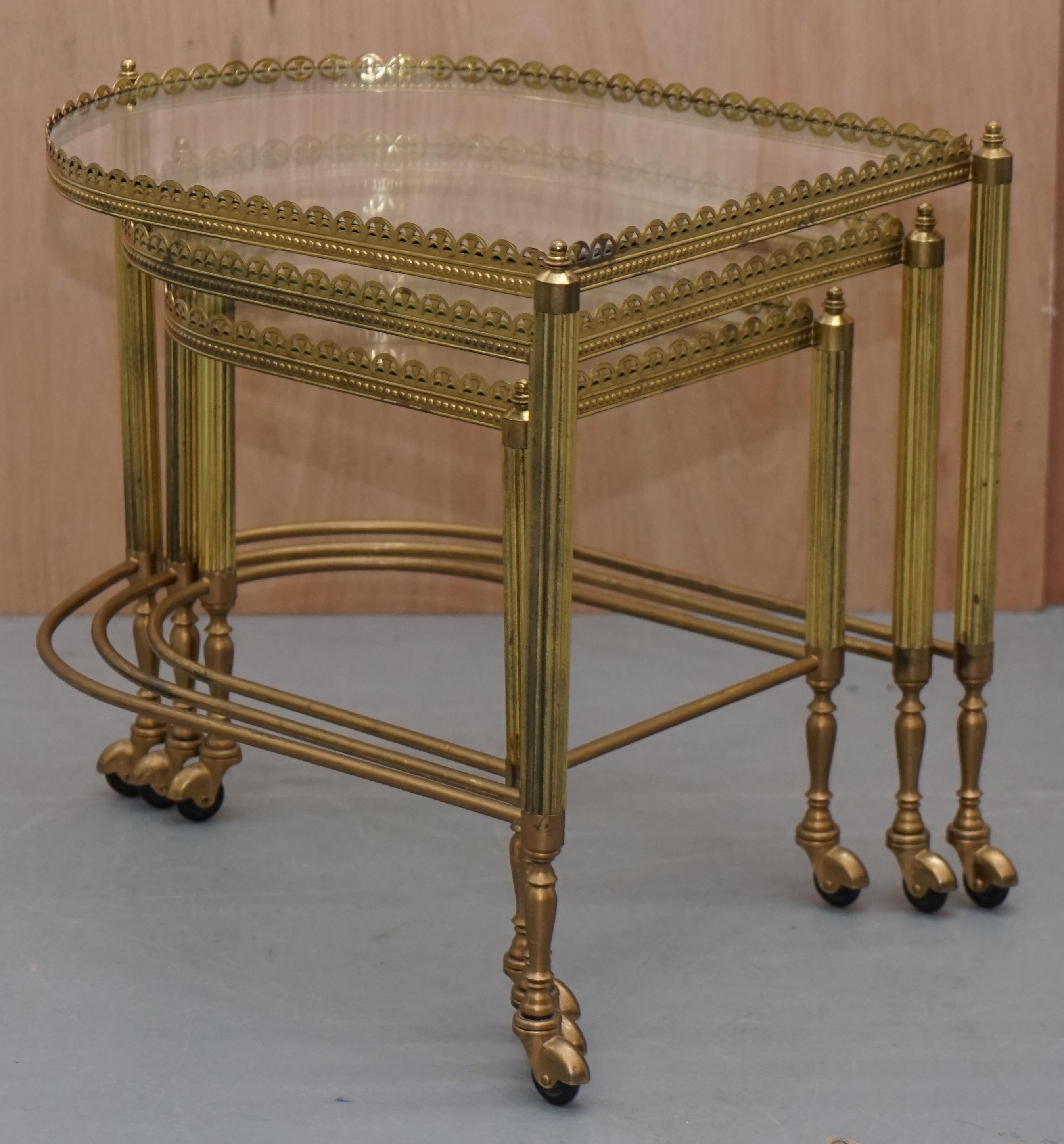 We are delighted to offer for sale this stunning set of three original mid century modern Maison Bagues trolley nested tables

A very good looking highly decorative and collectable nest of tables, each one is the style of a drinks, silver or tea