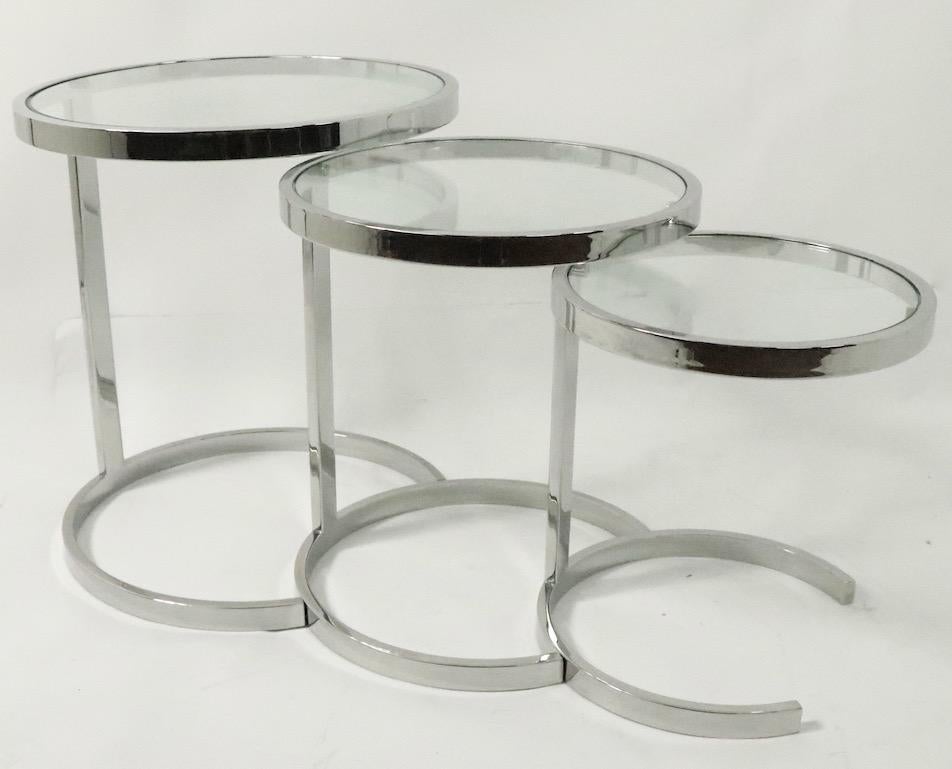 Nest of Three Chrome and Glass Tables 3