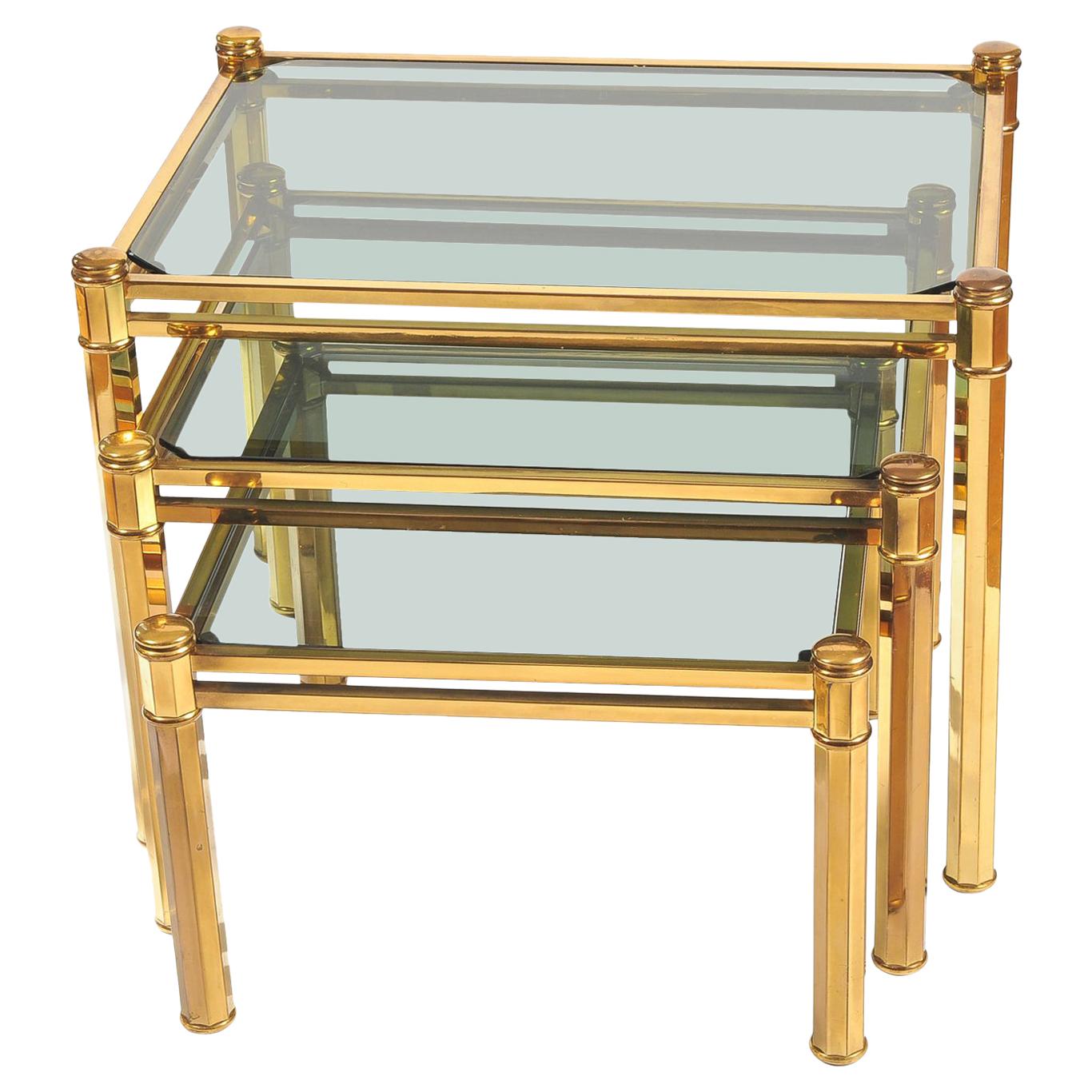 Nest of three Italian Brass Side Tables with lightly smoked glass tops, 1960