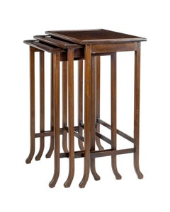 Nest of Three Mahogany Tables, by Waring and Gillow