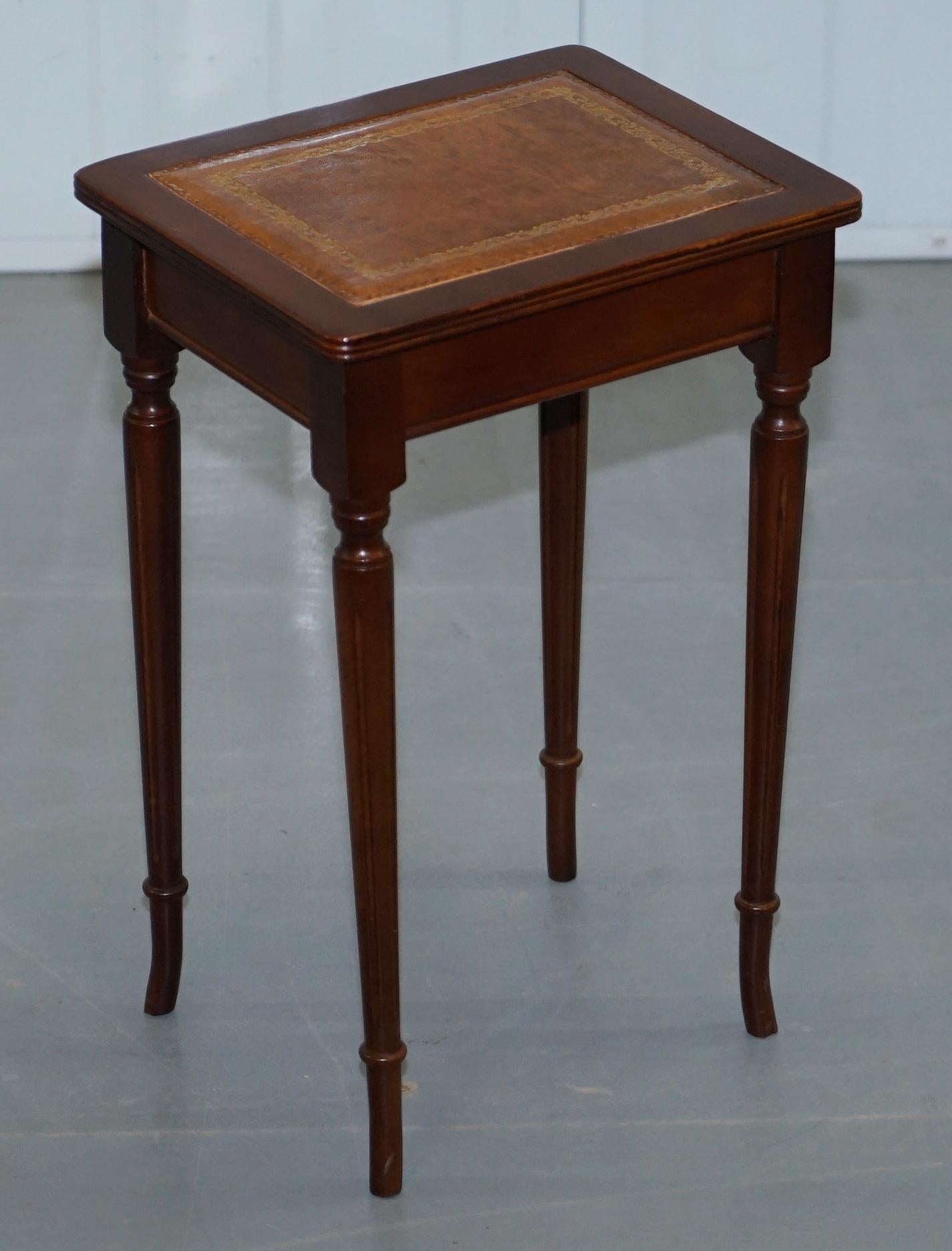 Nest of Three Mahogany with Brown Leather Top and Gold Leaf Embossed Side Tables 9