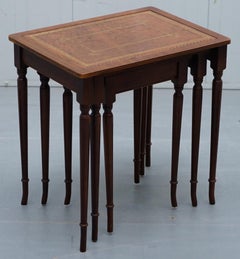Nest of Three Mahogany with Brown Leather Top and Gold Leaf Embossed Side Tables