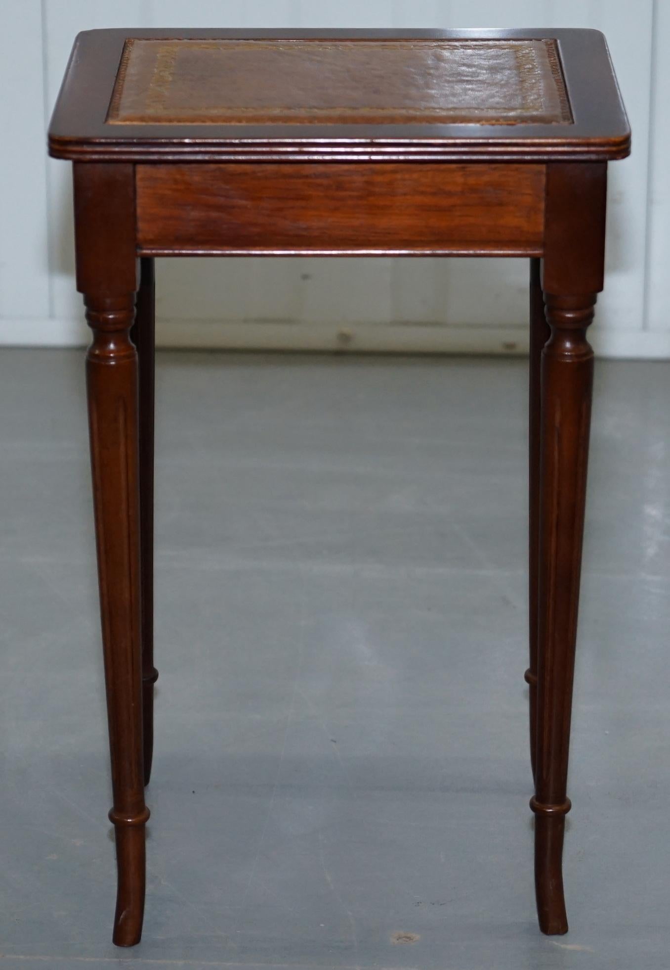 Nest of Three Mahogany with Brown Leather Top and Gold Leaf Embossed Side Tables 11