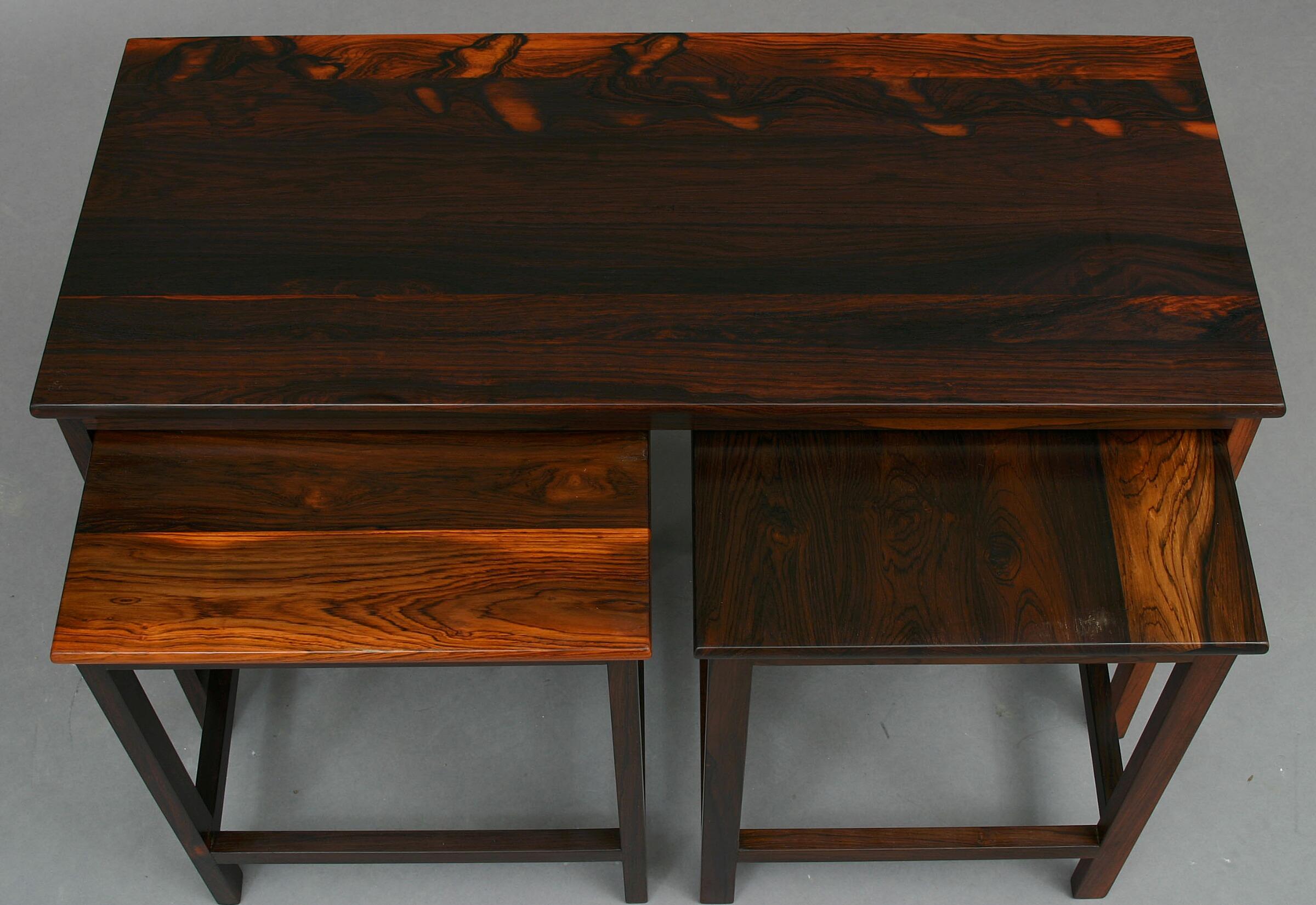 Nest of Three Solid Wood Tables, One Large and Two Small. Two sets available. Large table H. 53. L. 87. W. 38 cm. The other tables (x2) H. 49. L. 40. W. 38 cm. 