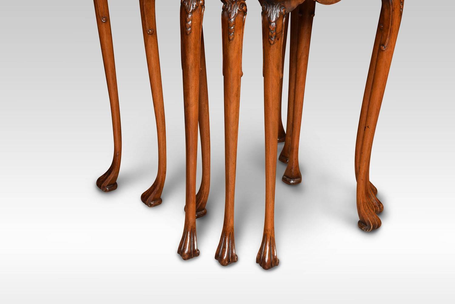 A nest of three burr walnut tables, having rectangular tops with carved moulded edge, raised up on slender acanthus capped cabriole support terminating in scrolling feet.
Dimensions:
Height 26 inches
Width 22 inches
Depth 16 inches.