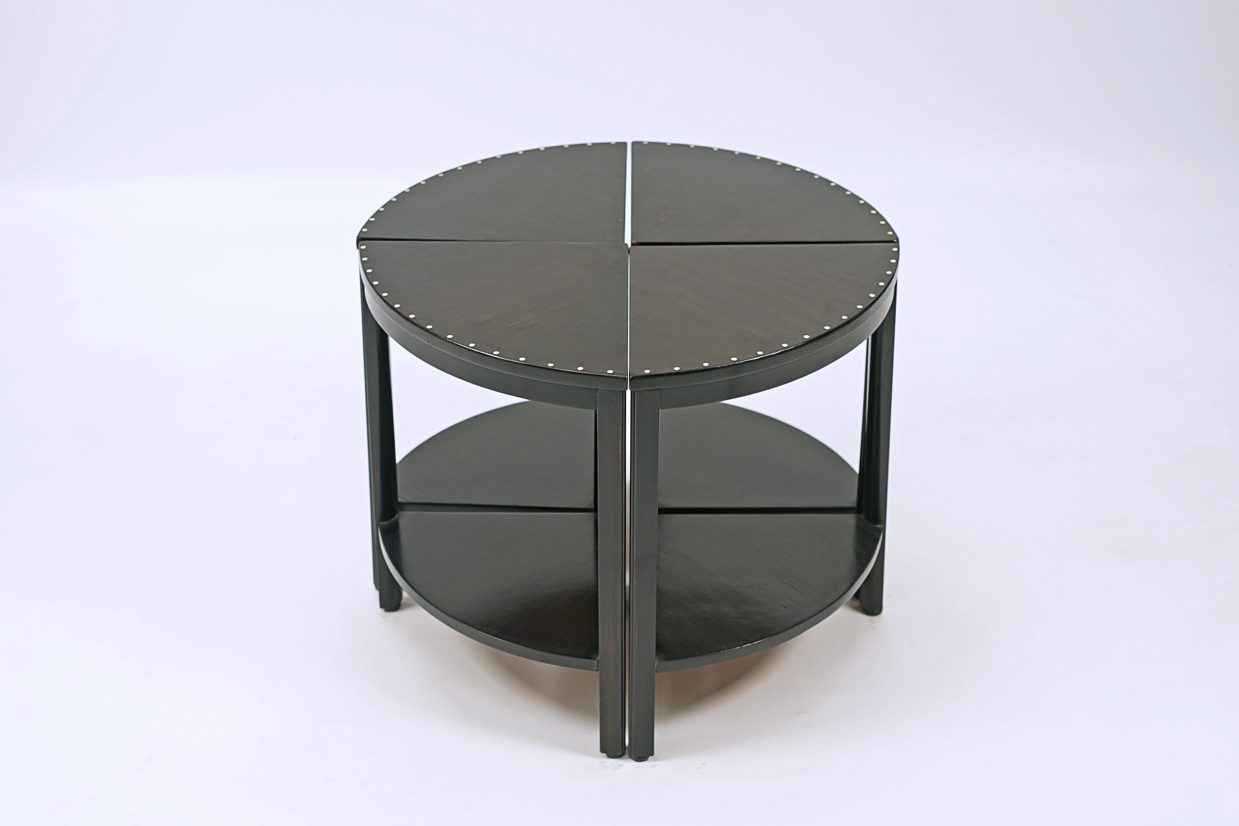 Table gigogne circulaire Art déco de Nordiska. Placage et incrustations en bouleau.

Argentine, CIRCA 1940.