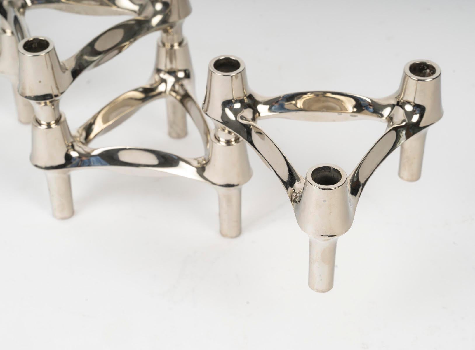 Nestbare und umbaubare Kerzenhalter aus verchromtem Metall, 20. Jahrhundert. (Französisch) im Angebot