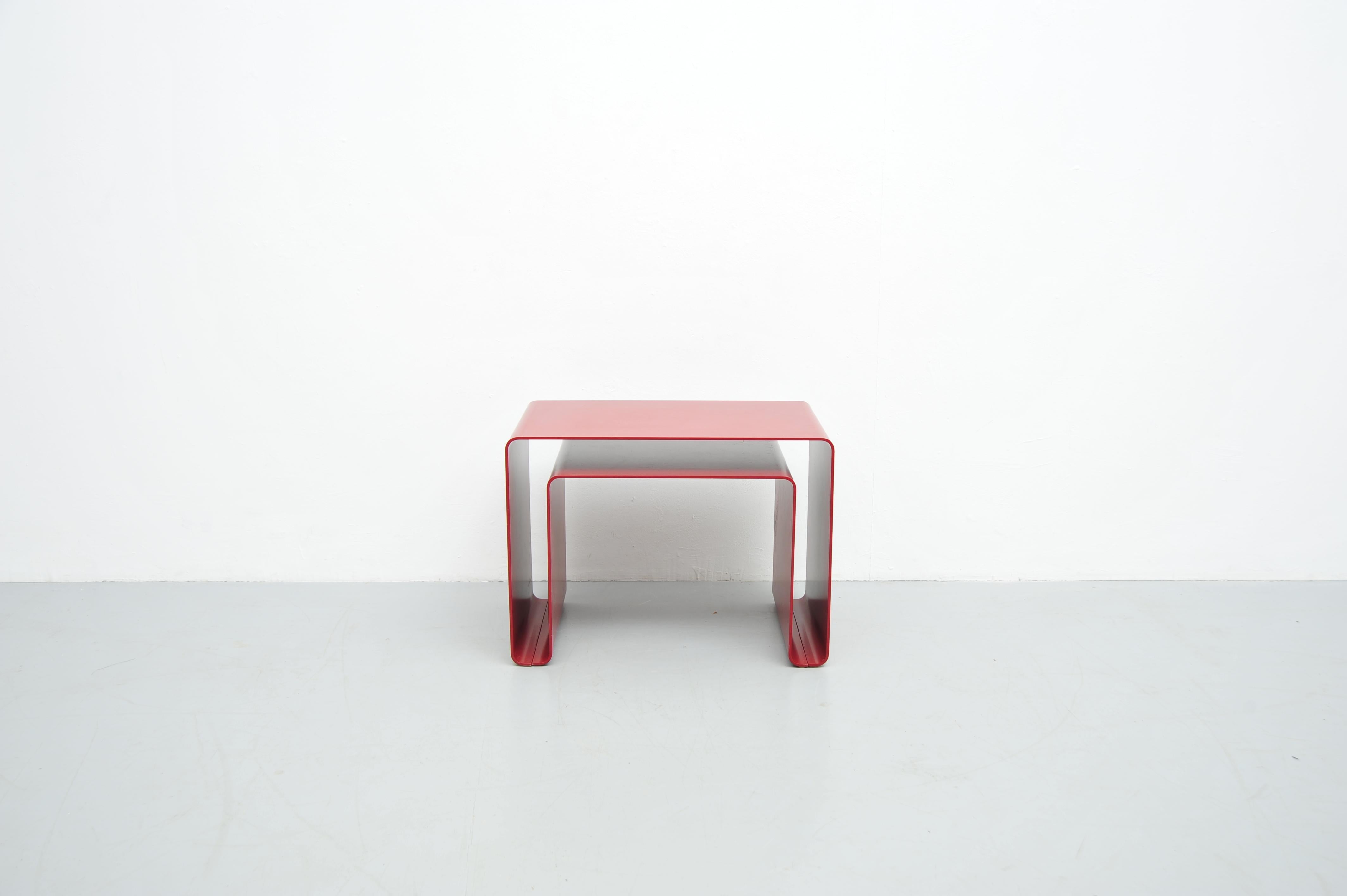 Designed by the legendary Dieter Rams in collaboration with Thomas Merkel, these nesting coffee tables (Low Table Program 010) represent the epitome of minimalist design. Created in 2001, the tables feature a clean, timeless aesthetic characterized