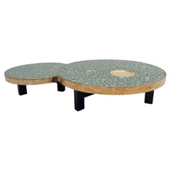 Nesting coffeetables in Bronze and Ceramic By Aliette Vliers