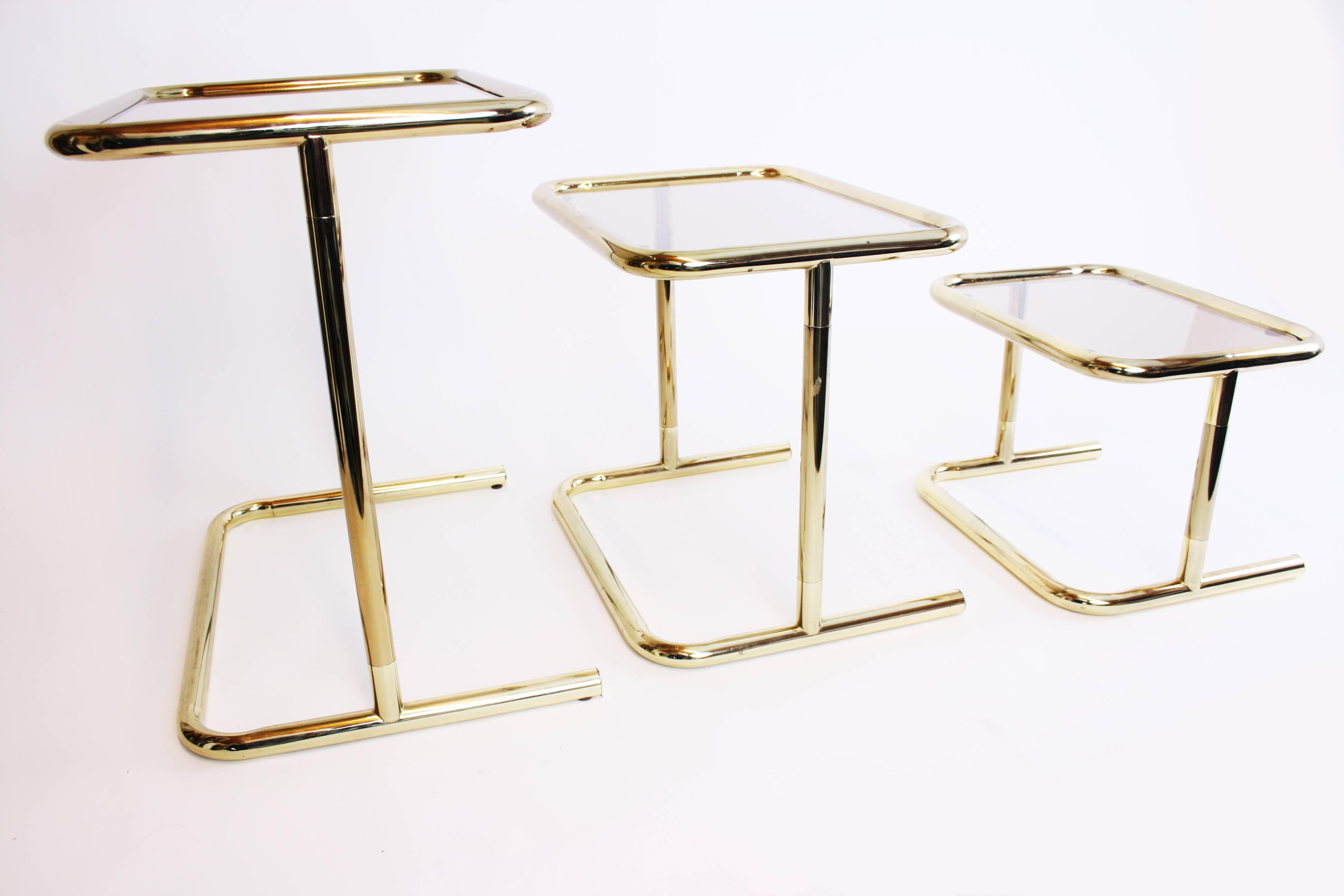 Mid-Century Modern Nesting Table Set Attributed to Design Pierre Cardin, Brass Smoked Glass, France For Sale