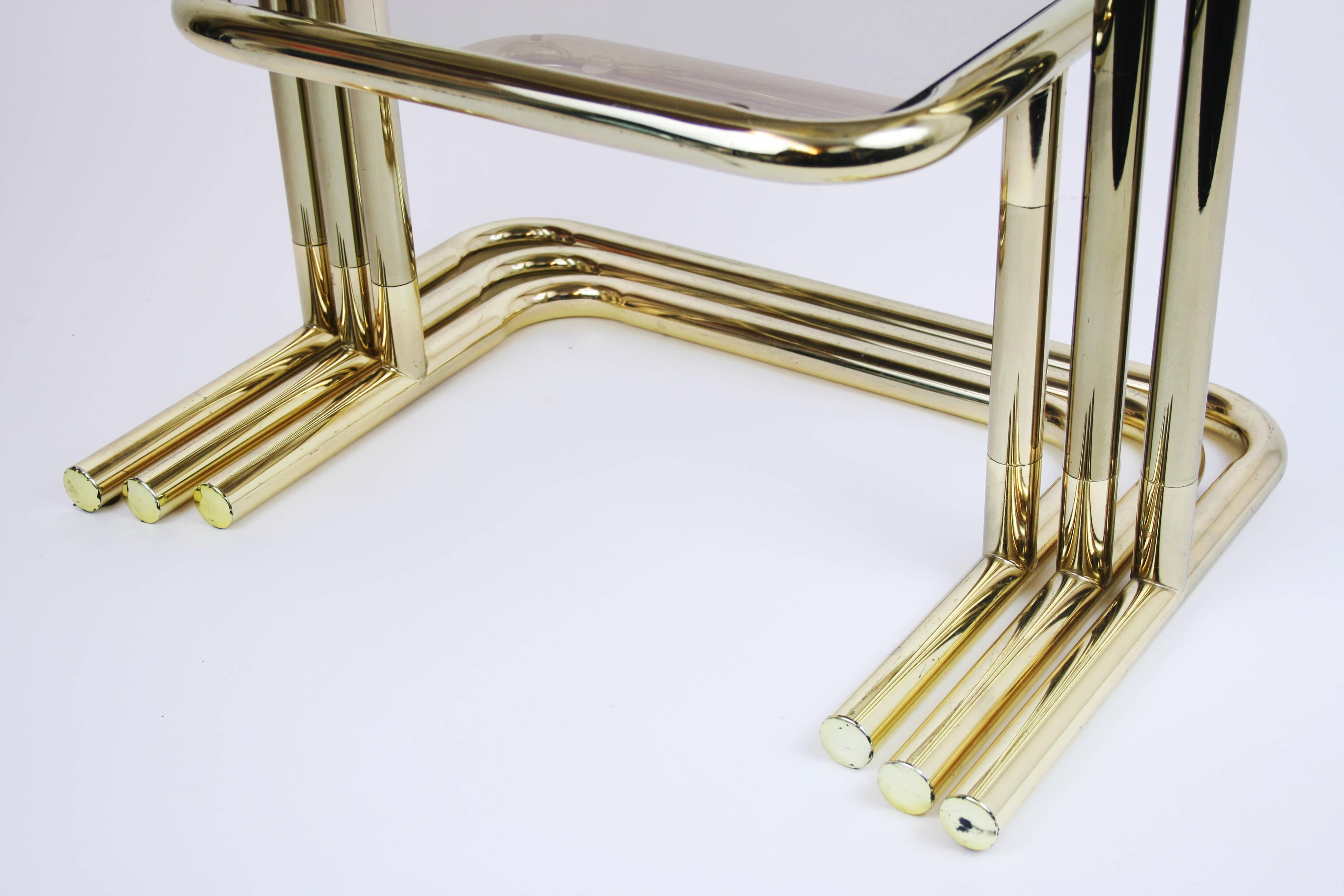 French Nesting Table Set Attributed to Design Pierre Cardin, Brass Smoked Glass, France For Sale