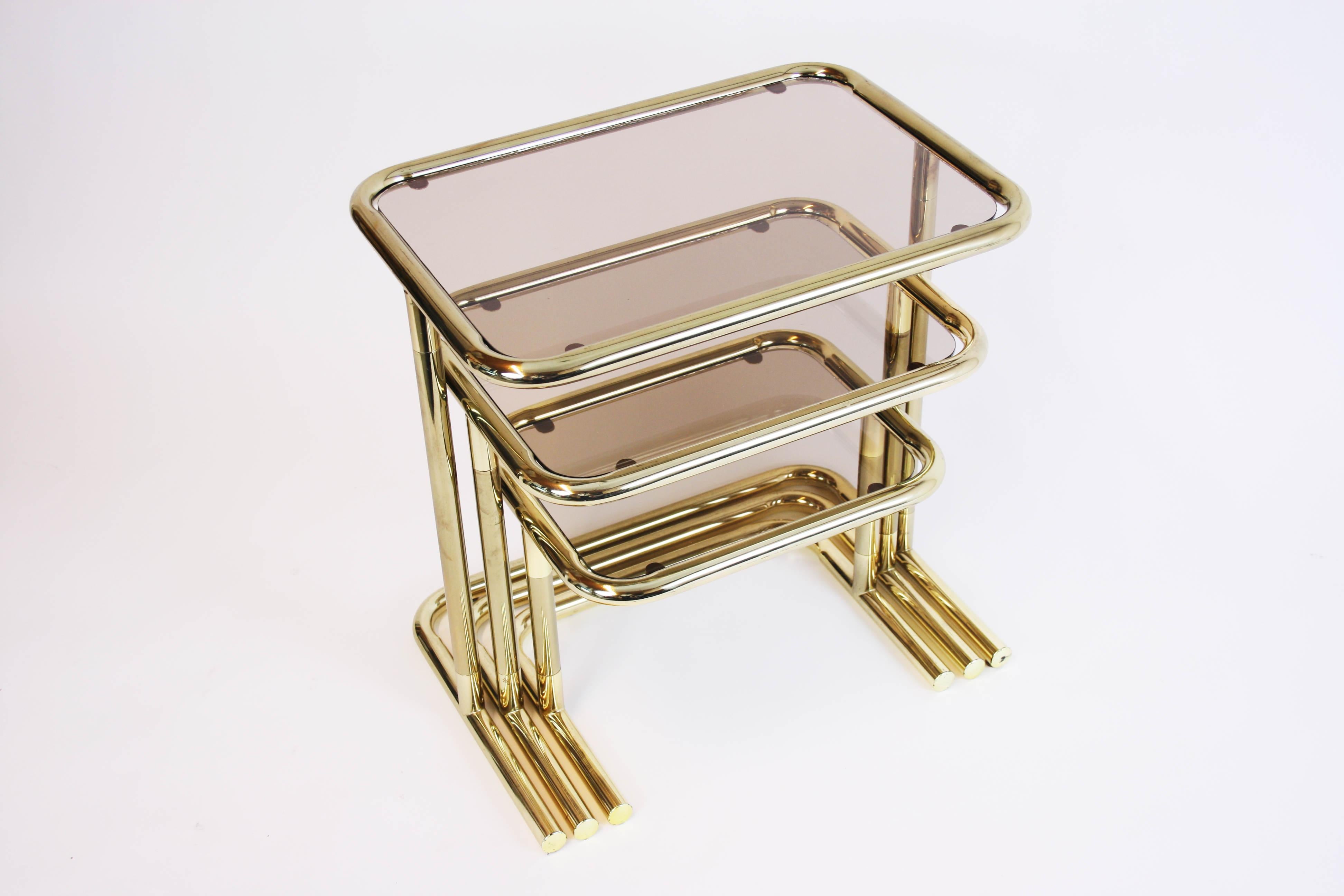 Late 20th Century Nesting Table Set Attributed to Design Pierre Cardin, Brass Smoked Glass, France For Sale