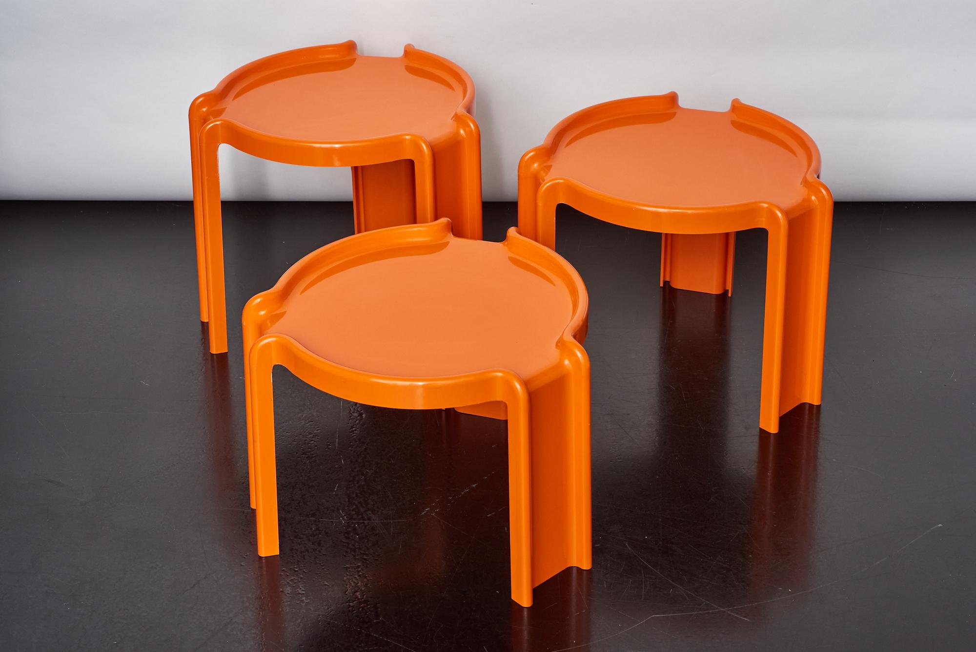 Vintage nesting tables in orange molded ABS plastic by Giotto Stoppino for Kartell.
These rare, unstamped stacking tables are an early Kartell production from 1973.
Excellent vintage condition.
