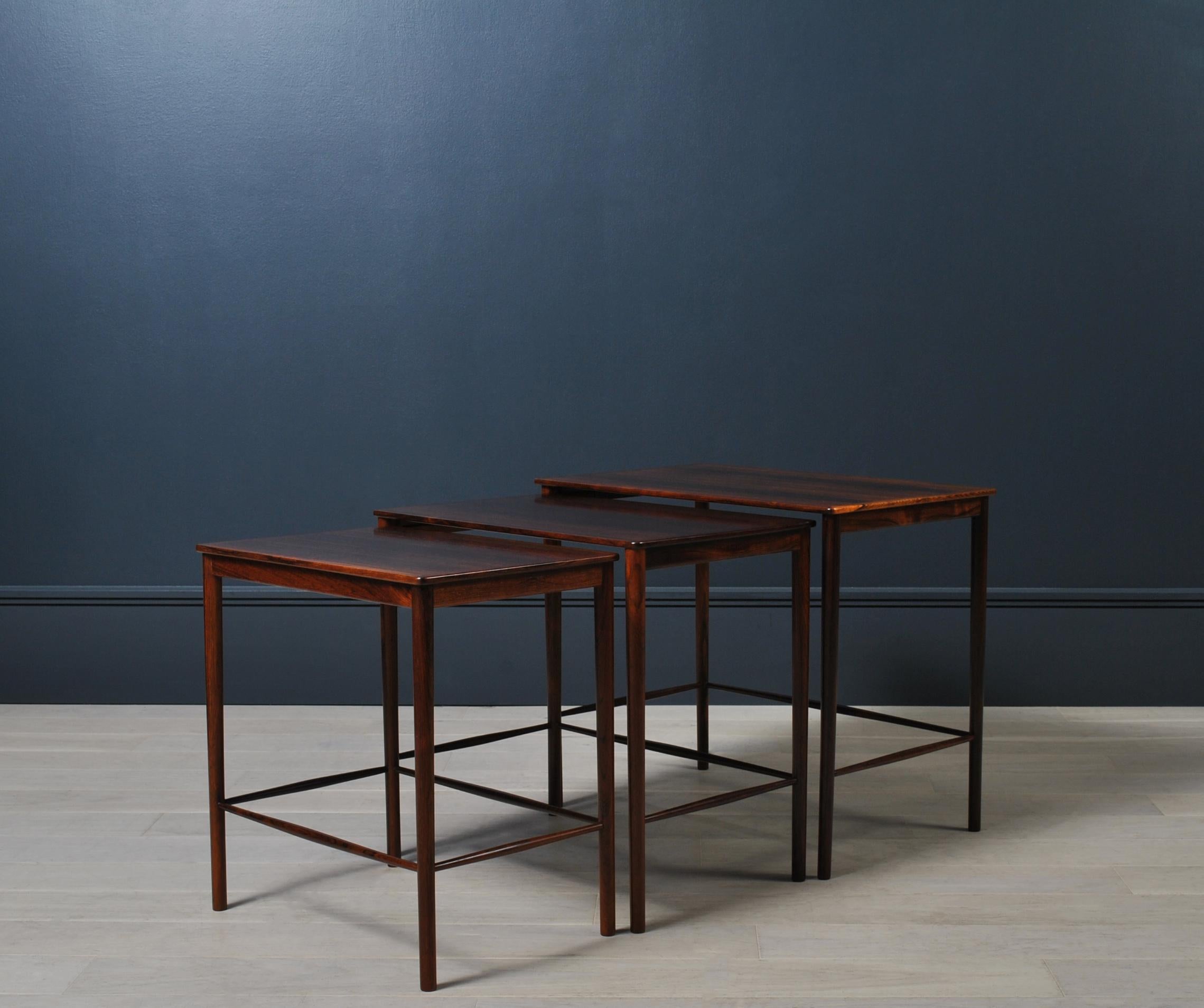 An incredible set of nesting tables designed by Grete Jalk for Poul Jeppesen. Produced by P Jeppesen in Denmark during the 1950’s. The subtlety and expertise within the design and execution is truly wonderful to see. 
A very fine piece of furniture