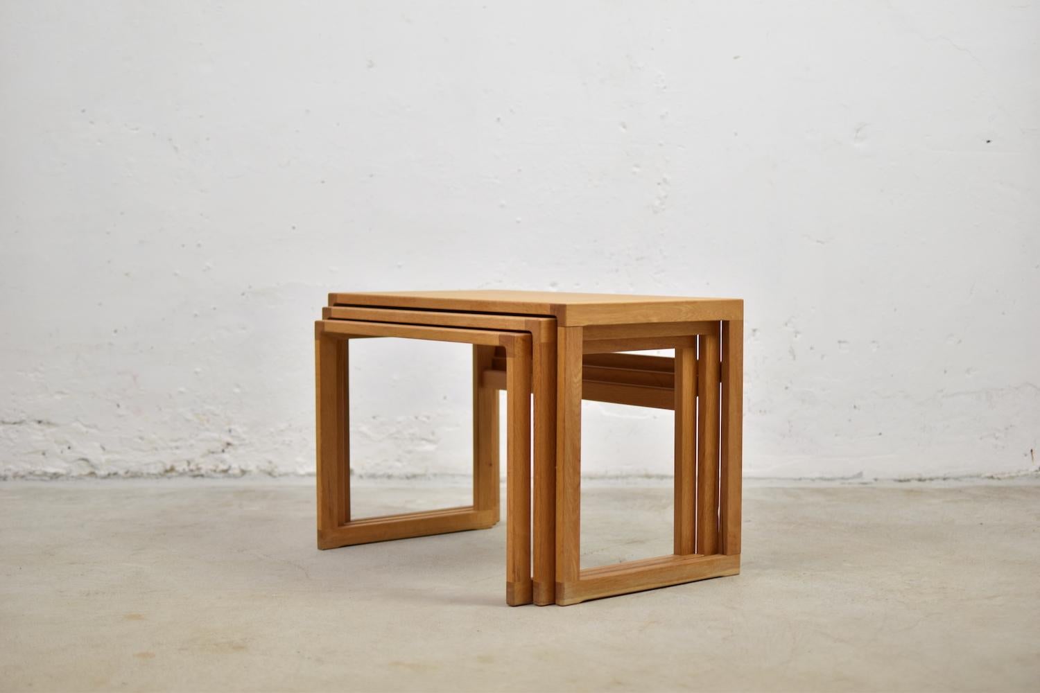 Lovely set of three nesting tables by Kai Kristiansen for Vildbjerg Møbelfabrik, Denmark, 1950s. This set is made out of oak. Clean lines. Professionally restored!