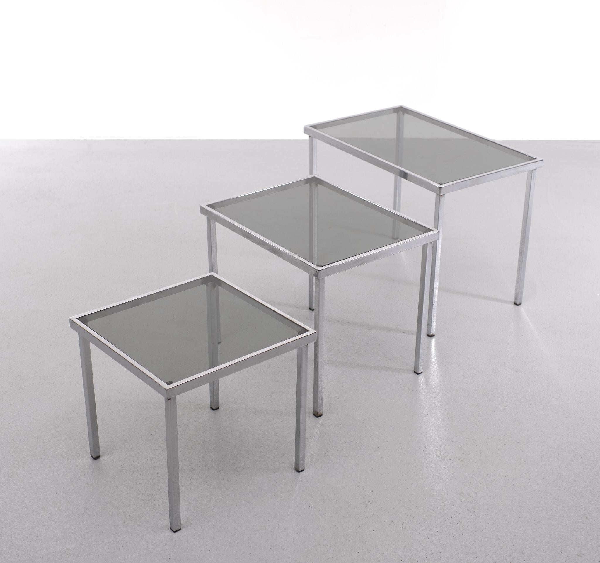 European Nesting Tables Chrome Frame Smoked Glass 1970s For Sale