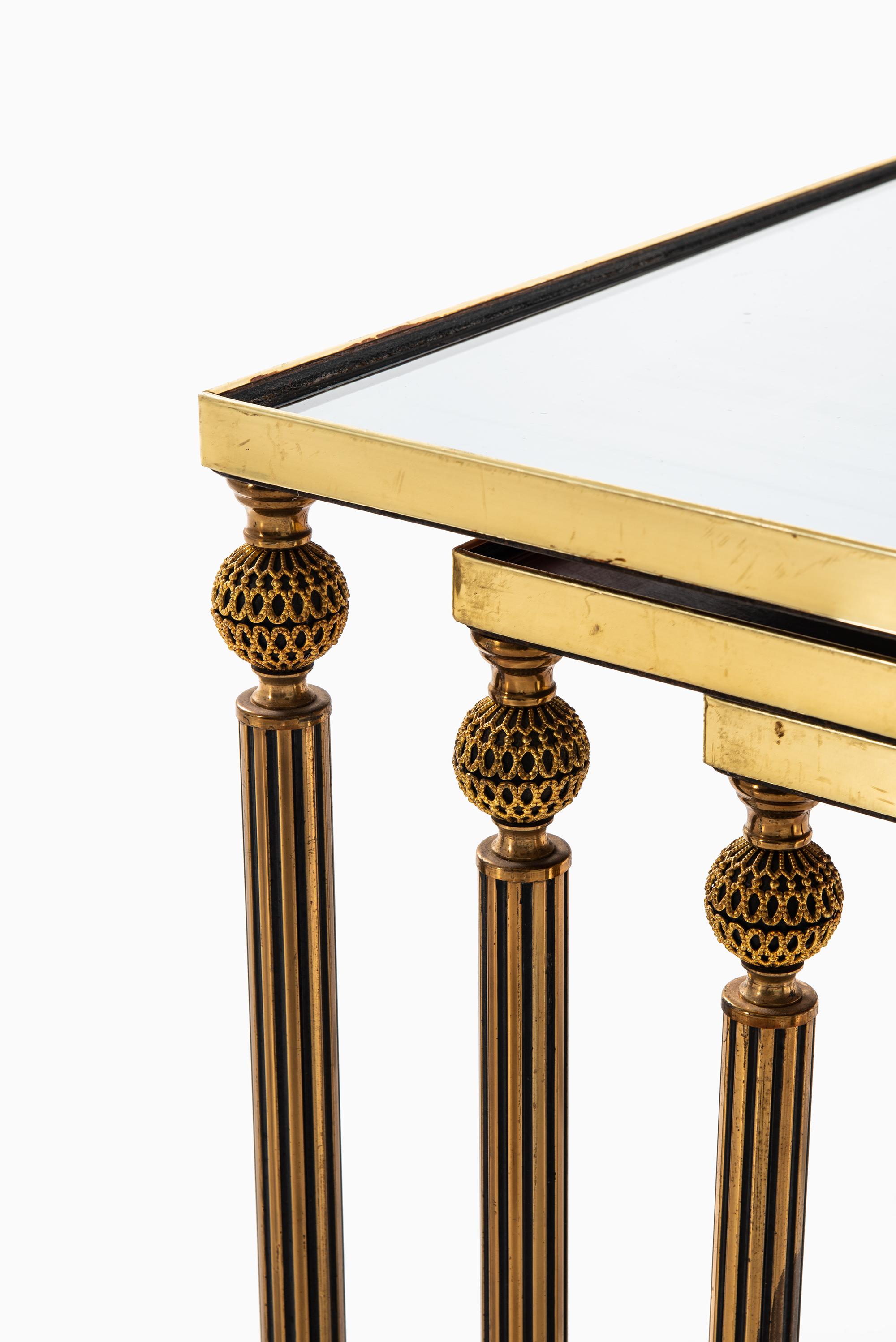 Mid-Century Modern Nesting Tables in Brass and Glass Probably Produced in Italy For Sale