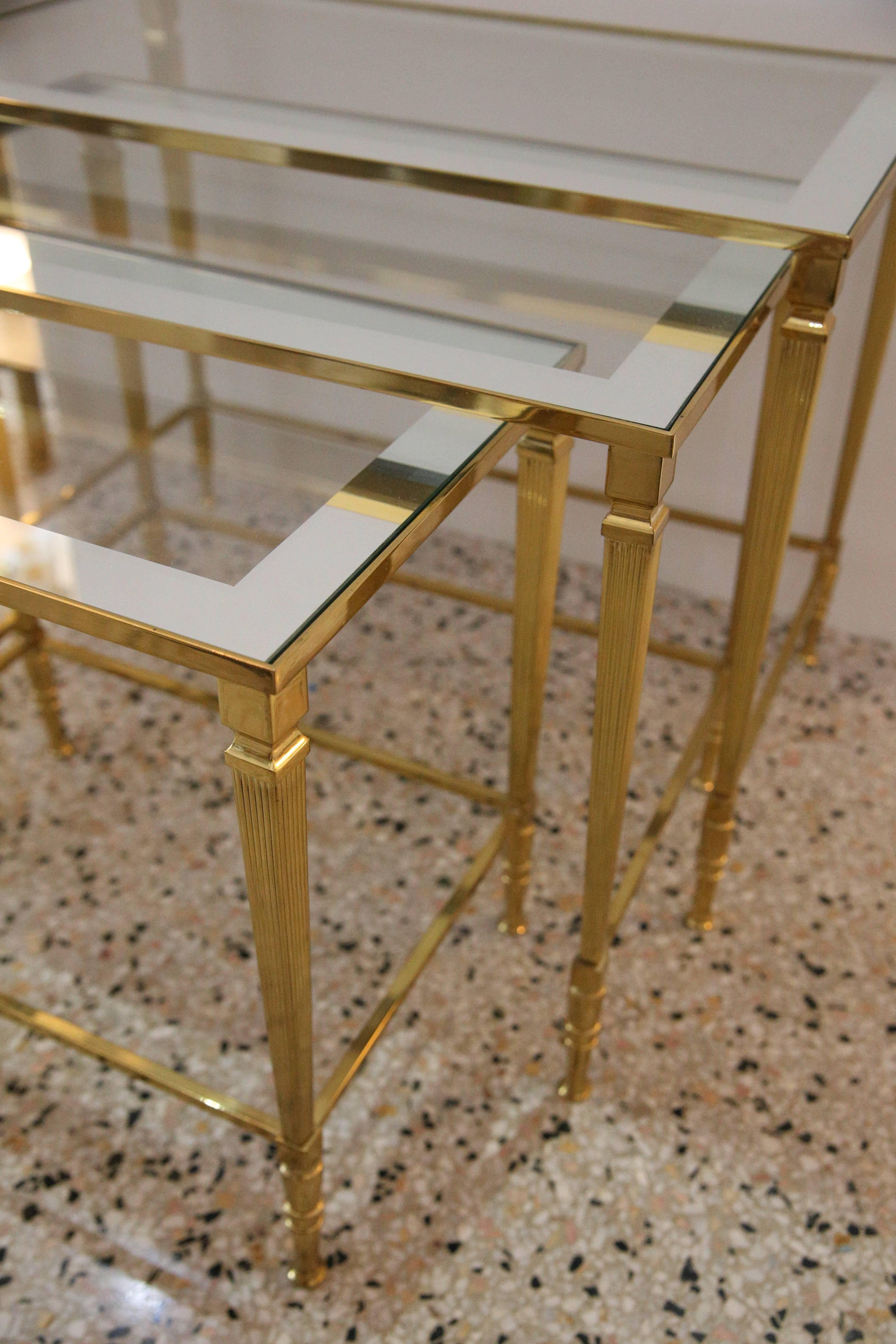 This stylish set of nesting tables date to the 1960s-1970s and were created by Maison Jansen. 

Note: These have been professionally polished and lacquered.

Note:  We have another identical set available which is the same style but in a slightly