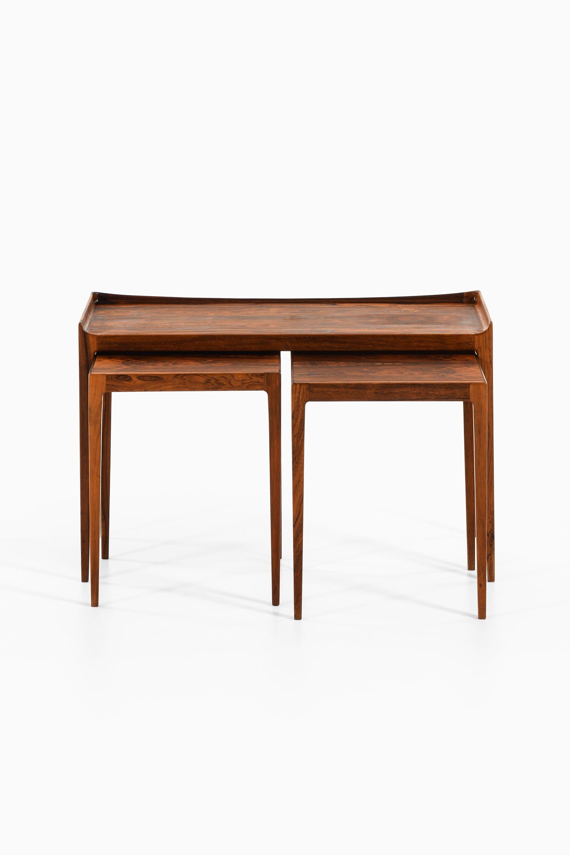 Nesting Tables in Rosewood by Kurt Østervig, 1960's

Additional Information:
Material: Rosewood
Style: Mid century, Scandinavian
Produced by Jason møbler in Denmark
Dimensions (W x D x H): 80 x 36 x 50.5 cm
Condition: Good vintage condition, with