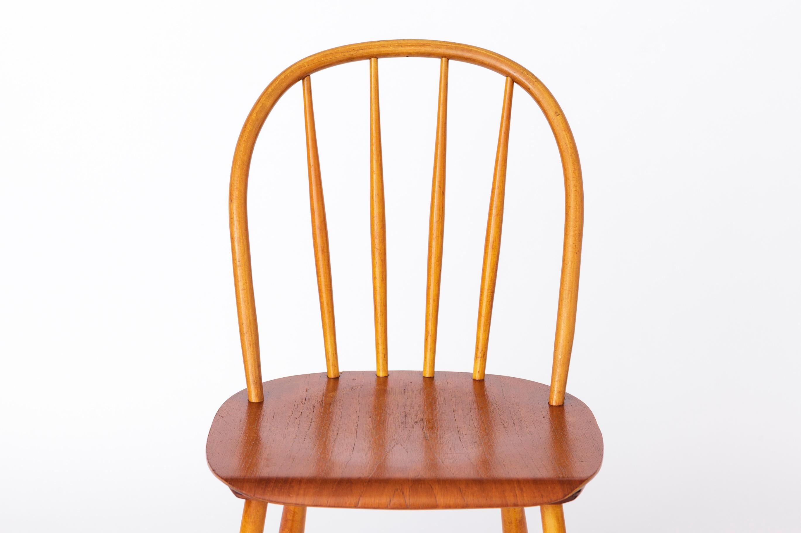 Vintage Dining Chair by manufacturer Nesto from the 1960s. 

This elegant chair features a sturdy frame crafted from teak and beech wood. The surface has been meticulously refurbished and oiled to enhance its natural beauty. A manufacturer's mark is