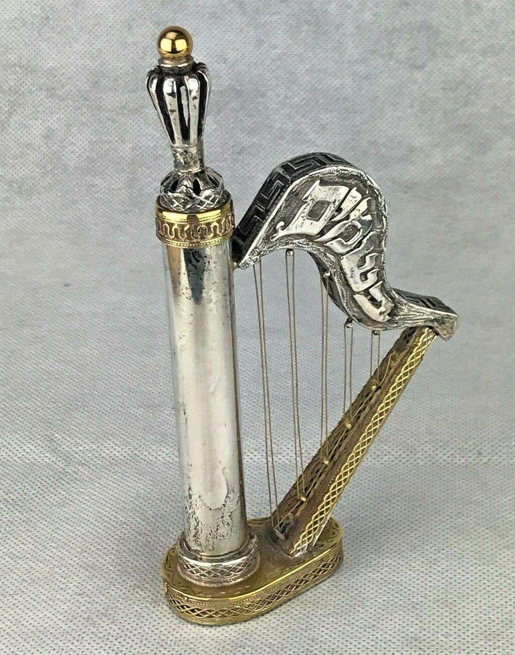 A sterling silver Besamim (spice) container, In the shape of Harp with Hebrew letters 