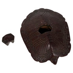 Netsuke in Boxwood in the form of a turtle hidden in its shell