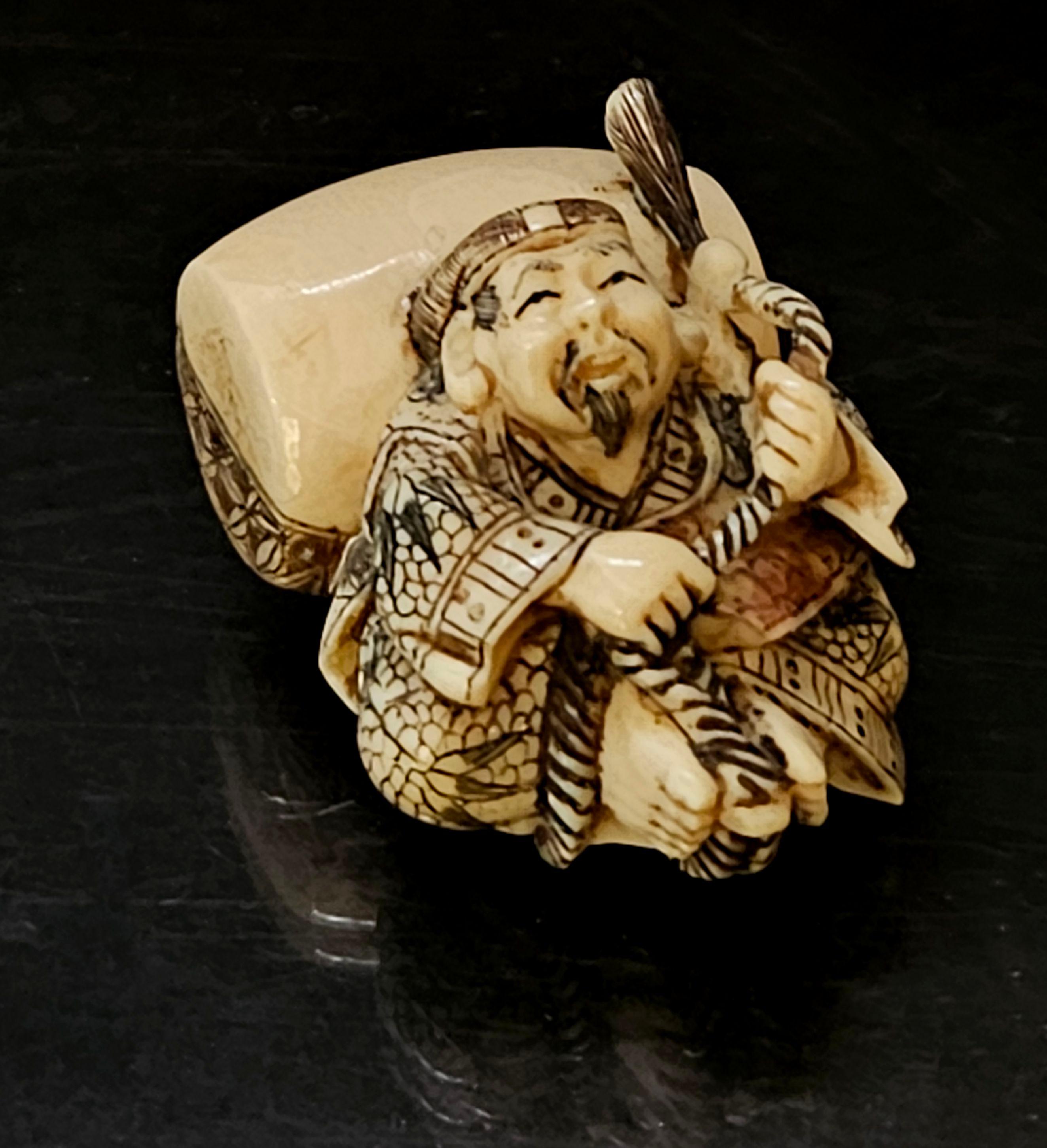 Netsuke Japanese Hand-Carved Polychrome Decorated Figure, Signed by Matsuyoshi, from the Meiji period. Ric.NA003
A truly hand-carved mixed material figure, A Wise Man Holding a Rope, shows a museum quality in detailing, signed by Matsuyoshi. A super