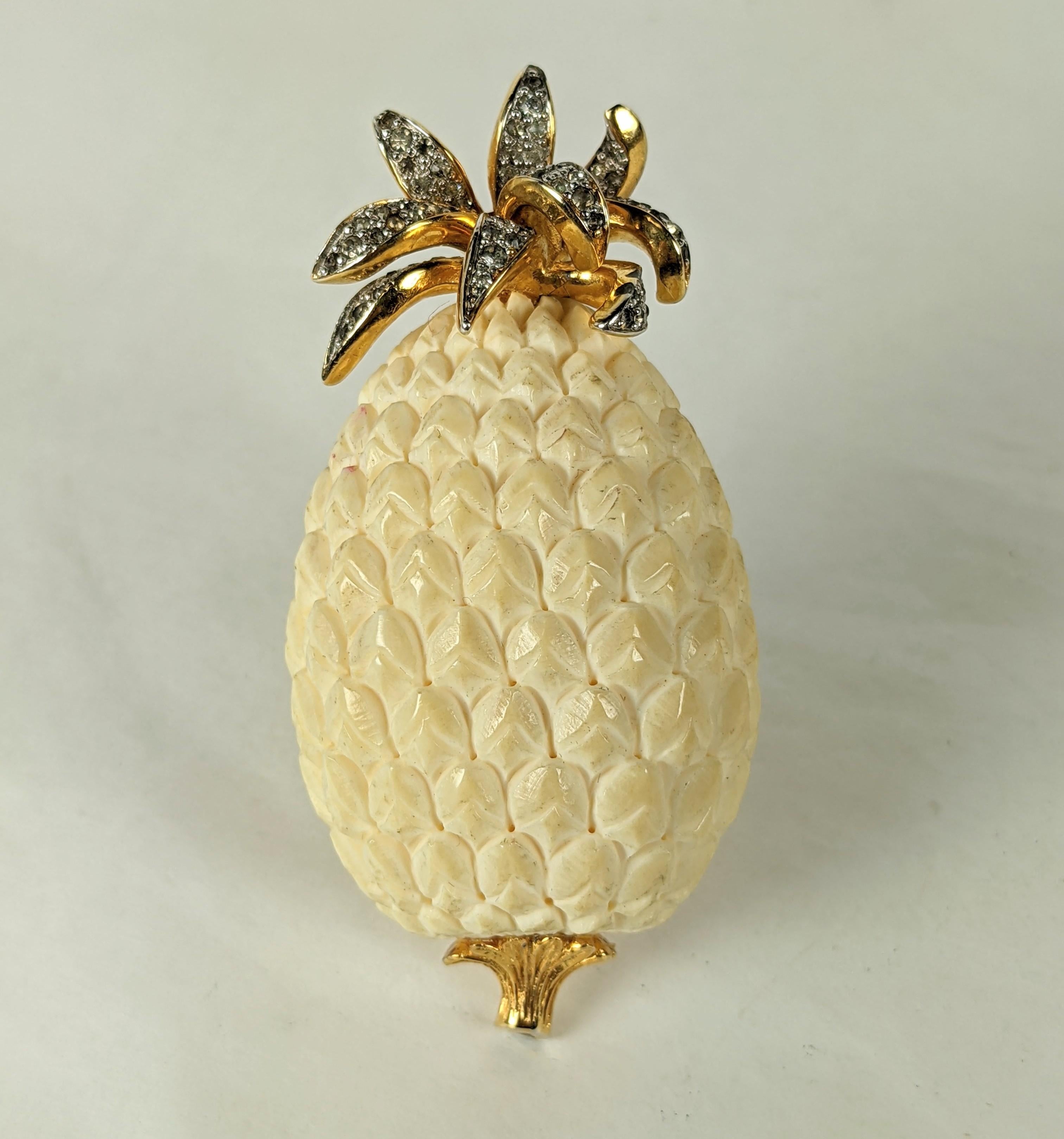 Nettie Rosenstein Carved Bone Pineapple Brooch from the 1960's. Hand carved and set in gilt metal with pave accents.  2.75