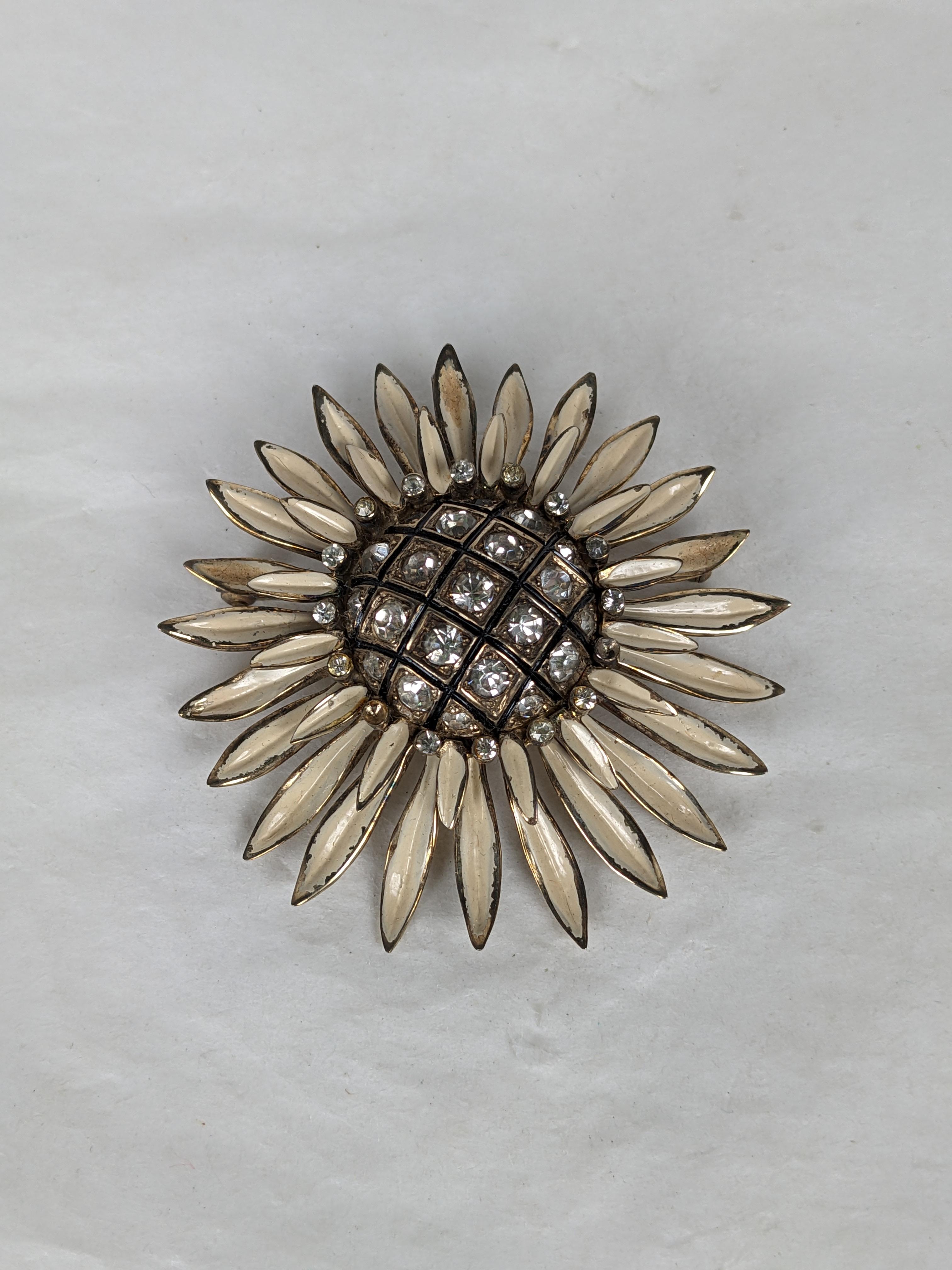 Nettie Rosenstein Retro Sunflower pendant brooch. Of rose gold plated sterling silver, white and black cold enamel and crystal rhinestone pave. Minor wear to enamel. L 2 1/8