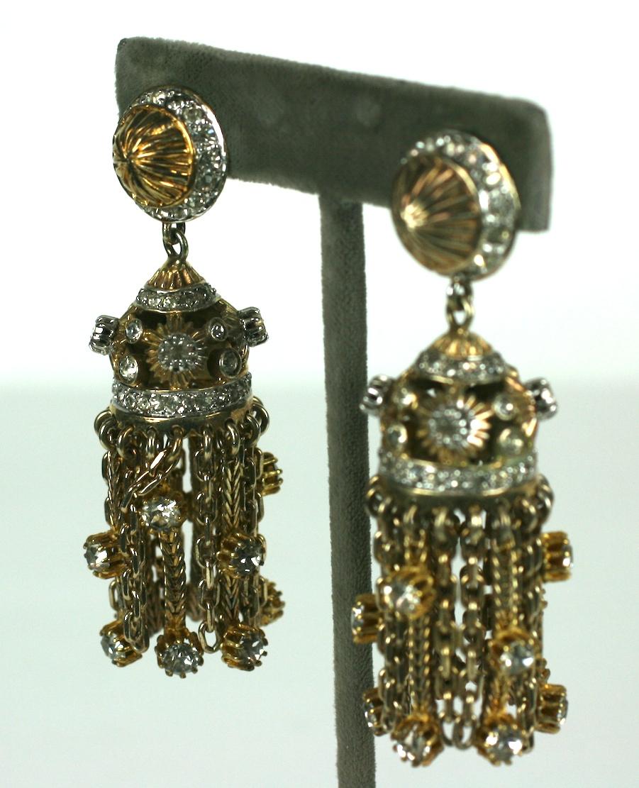 Elegant Nettie Rosenstein Sterling Vermeil Tassel Earrings with paste accents. Wonderful design with prong set pastes set on various styles of chain on each tassel. Clip back fittings.
1940's USA. Signed 