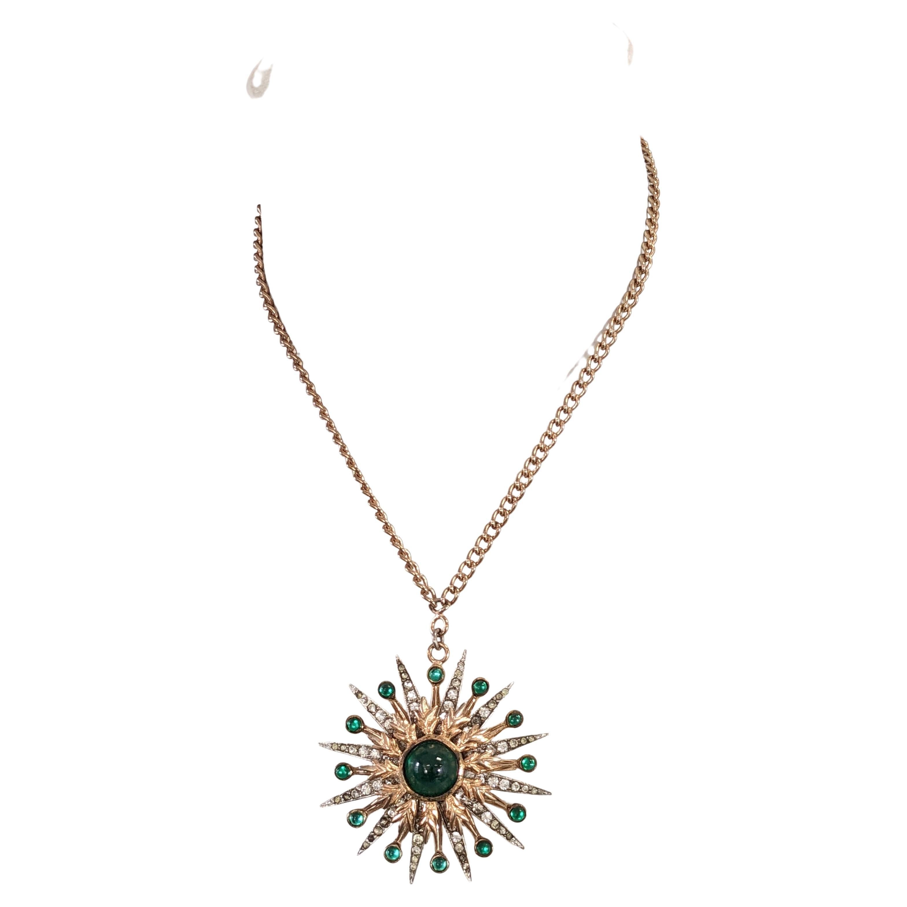 Nettie Rosenstein Vermeil Starburst Pendant set in sterling with pink gold vermeil finish. Set with crystal pastes and emerald cabocchons. Circa 1940's on original chain. 1940's USA. Signed. Pendant 2