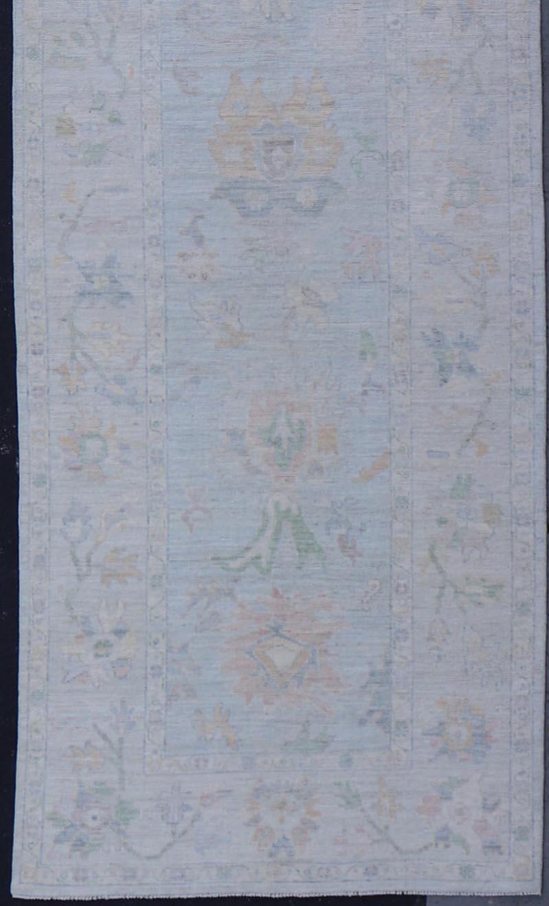 Contemporary Neutral Color Gallery Oushak Runner with Medallion Design in Light Blue Field For Sale