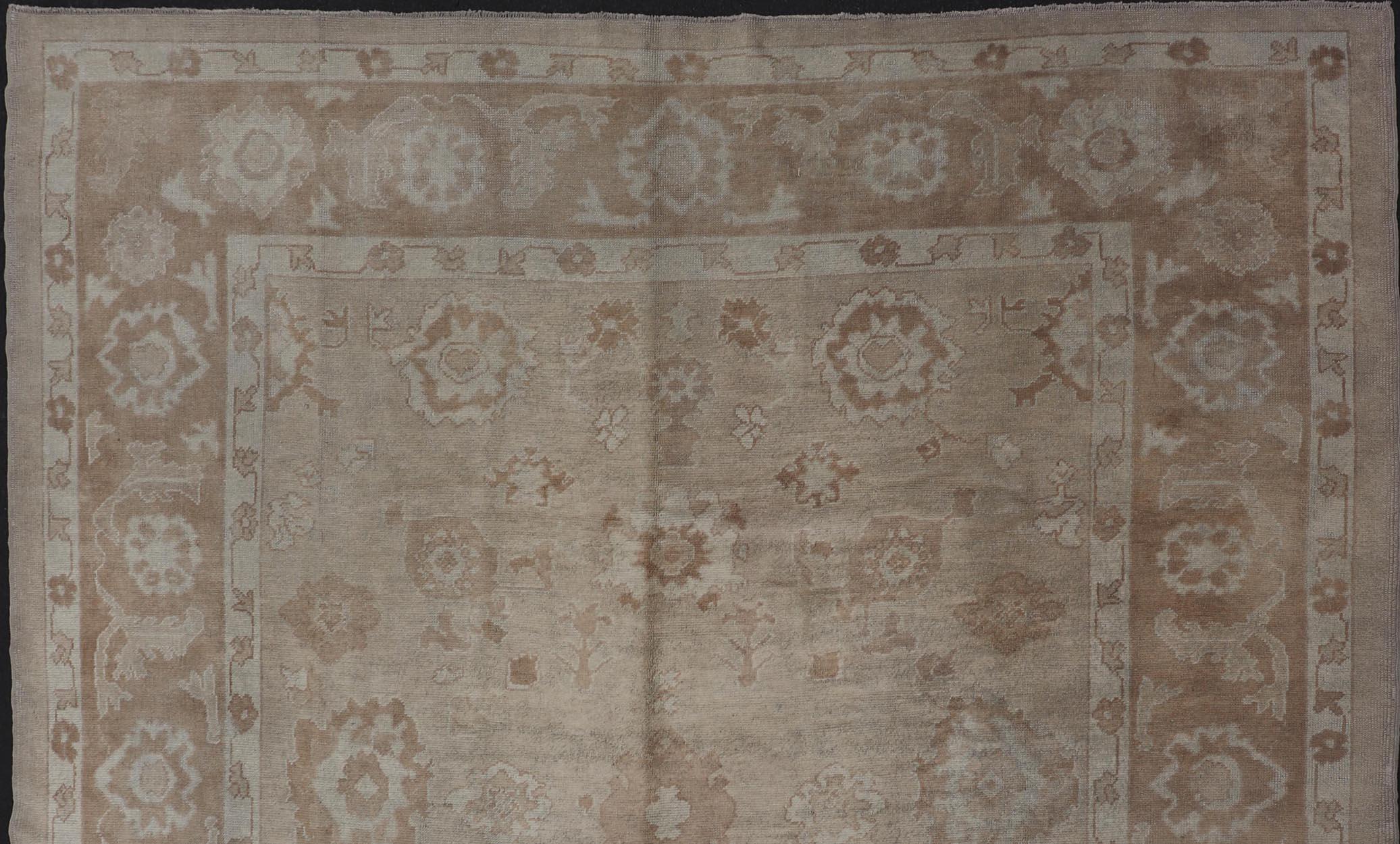 Vintage Turkish rug in light brown and cream Angora Oushak rug from Turkey, rug en-4573, country of origin / type: Turkey / Angora Oushak

This wonderful piece is made with a combination of angora and old wool. Featuring all organic materials,