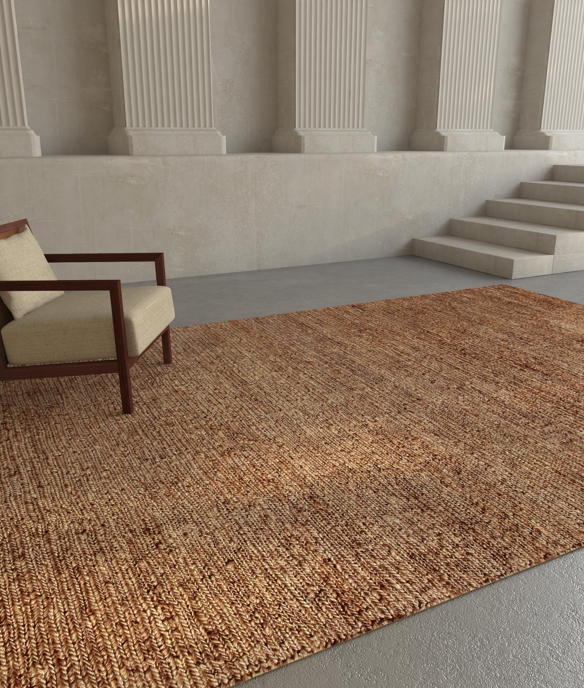 Questo tappeto incarna splendidamente l'eleganza senza tempo e il design contemporaneo, creando un punto focale sofisticato per qualsiasi spazio abitativo. Questo tappeto rettangolare presenta un motivo accattivante nei toni morbidi e caldi del