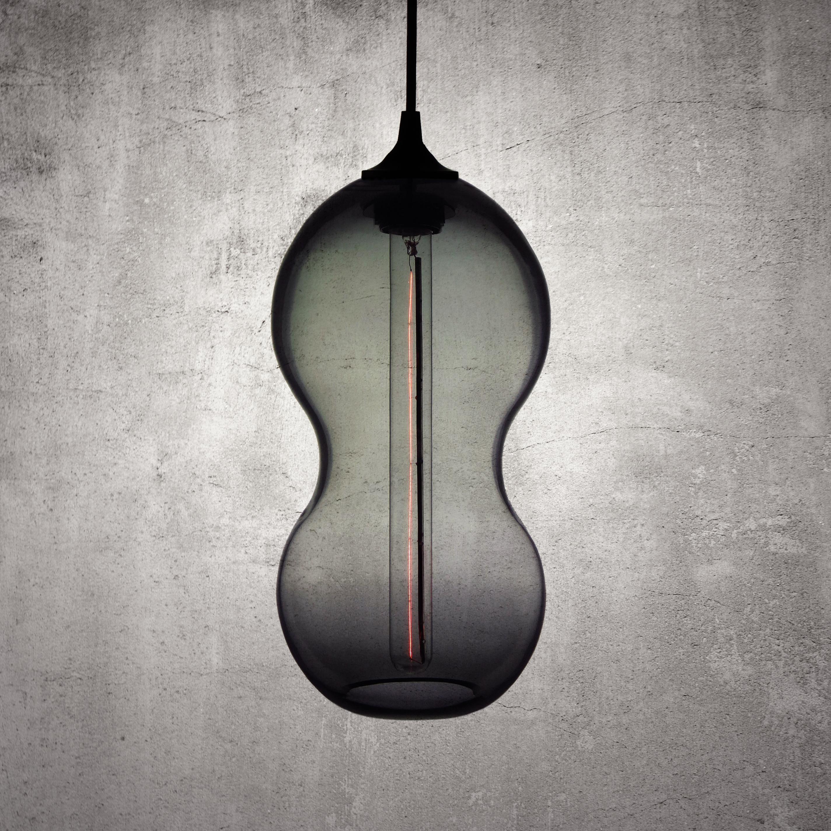 The form of the pod is universal as is the seed, distinctive and familiar - subtle and curvaceous, softly complementing its surrounds. This was exactly our intention when creating the Cacahuate lamp. We wanted a form that complimented rather than